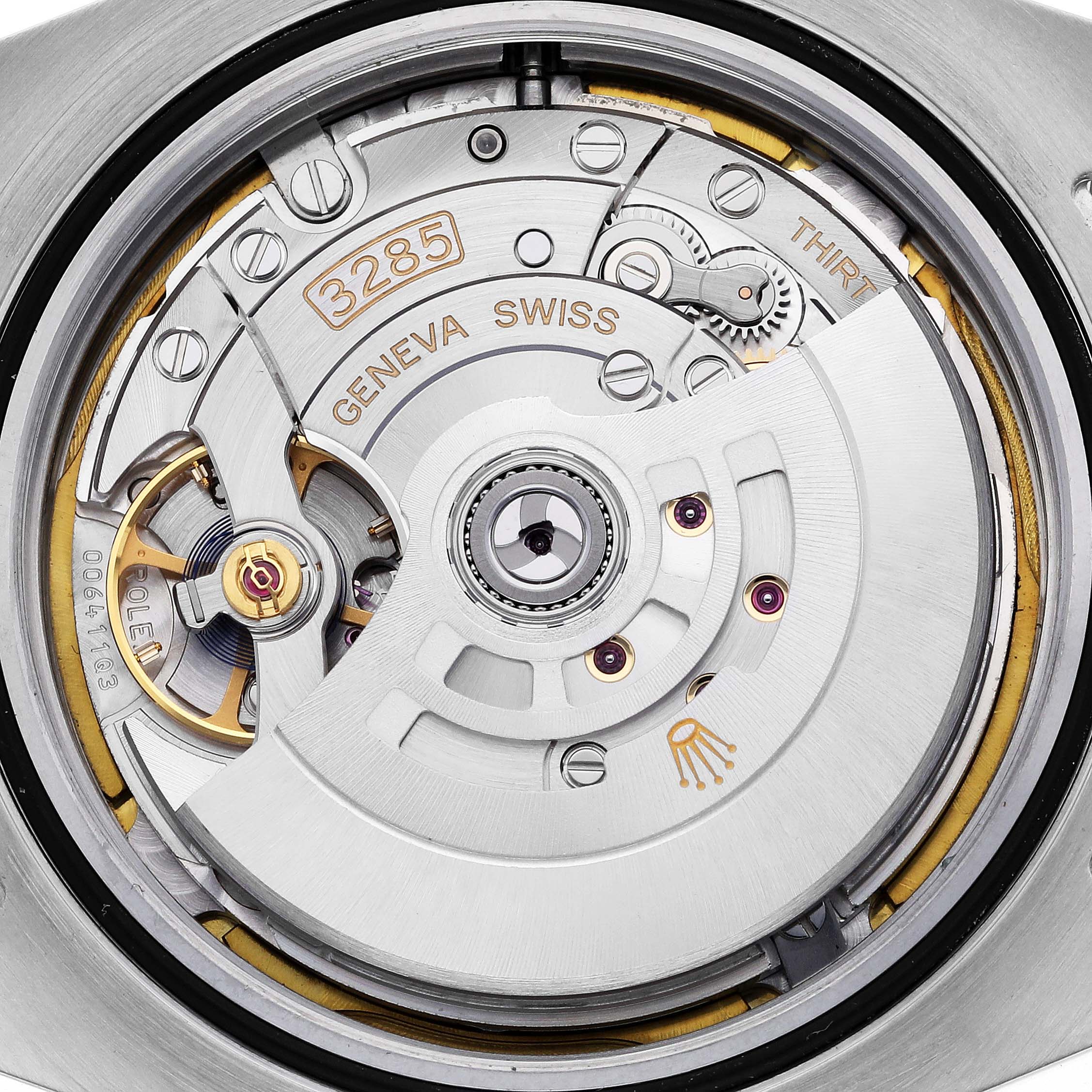 The image shows a close-up of the movement inside a Rolex Explorer M226570-0002 Men's Stainless Steel Black Dial M226570-0002 Men's Stainless Steel Black Dial watch, focusing on the intricate mechanical parts.