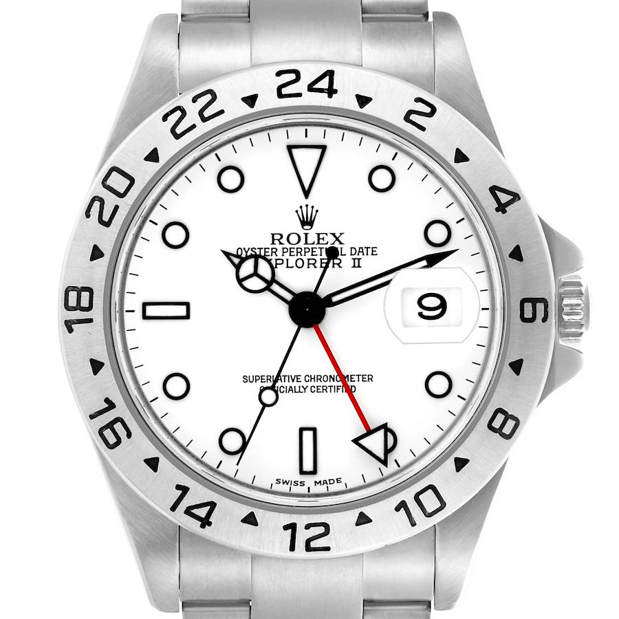 The Rolex Explorer II watch is shown from the front, highlighting its white dial, bezel, and date magnifier.