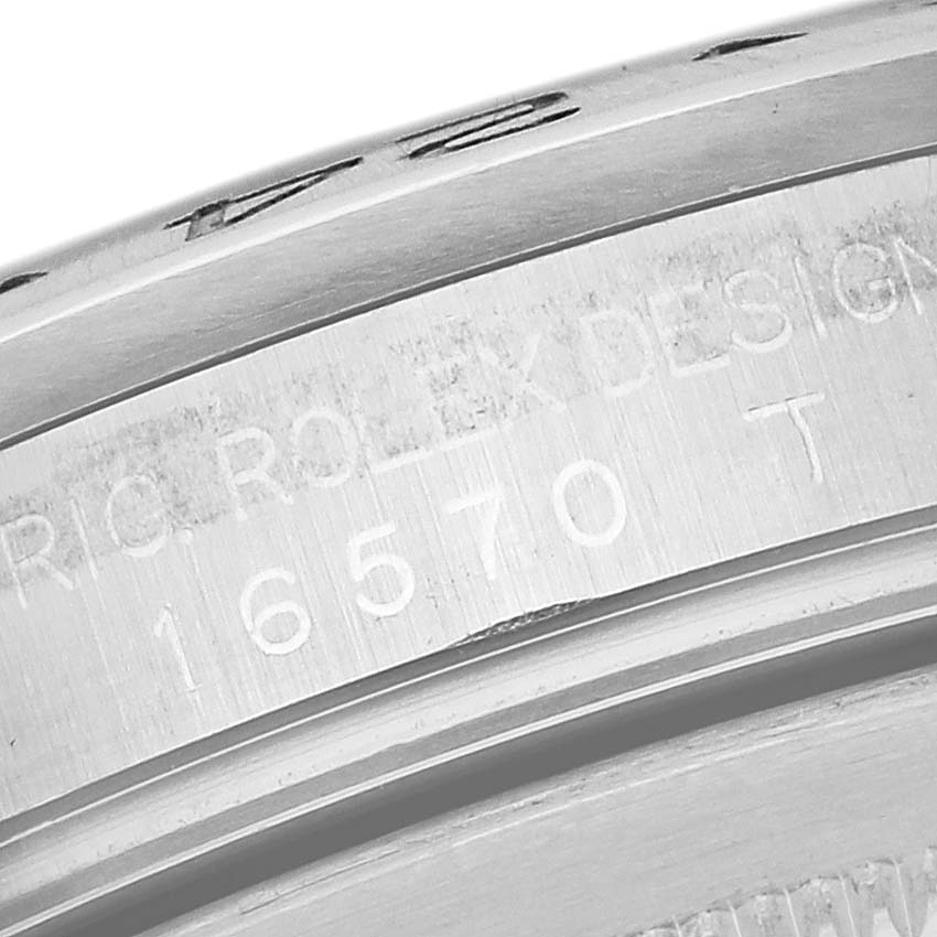 The image shows a close-up of the case back engravings of a Rolex Explorer 16570 Men's Stainless Steel White Dial 16570 Men's Stainless Steel White Dial watch.