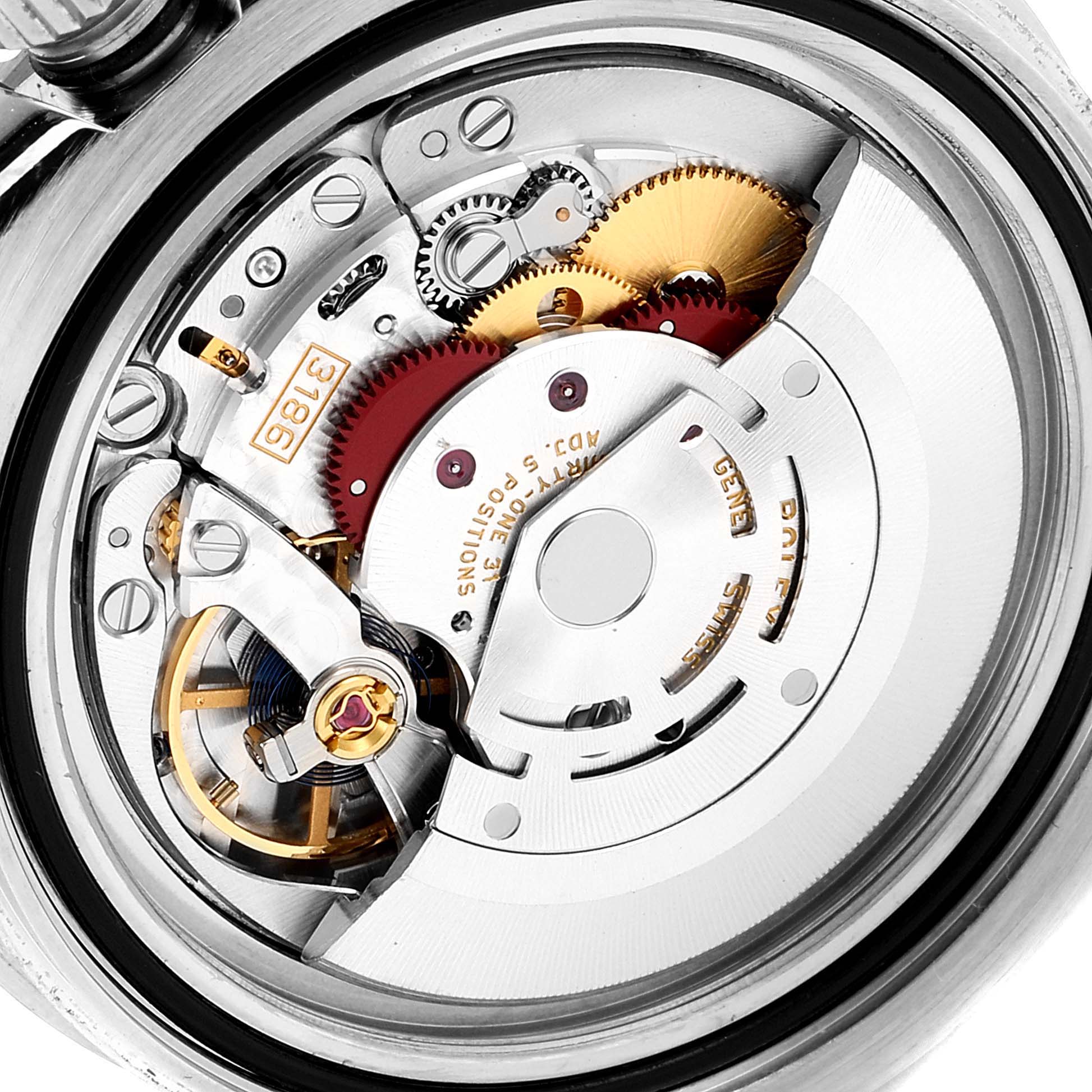 This is a close-up of the internal mechanism of a Rolex GMT-Master 116710 Men
s Stainless Steel Black Dial 116710 Men
s Stainless Steel Black Dial watch, showing gears and components.