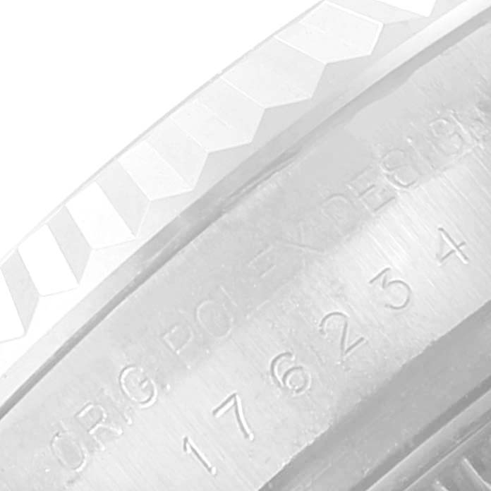 This image shows a close-up of the engraved inner bezel of a Rolex Oyster Perpetual 176234 Women's Stainless Steel Black Dial 176234 Women's Stainless Steel Black Dial watch.