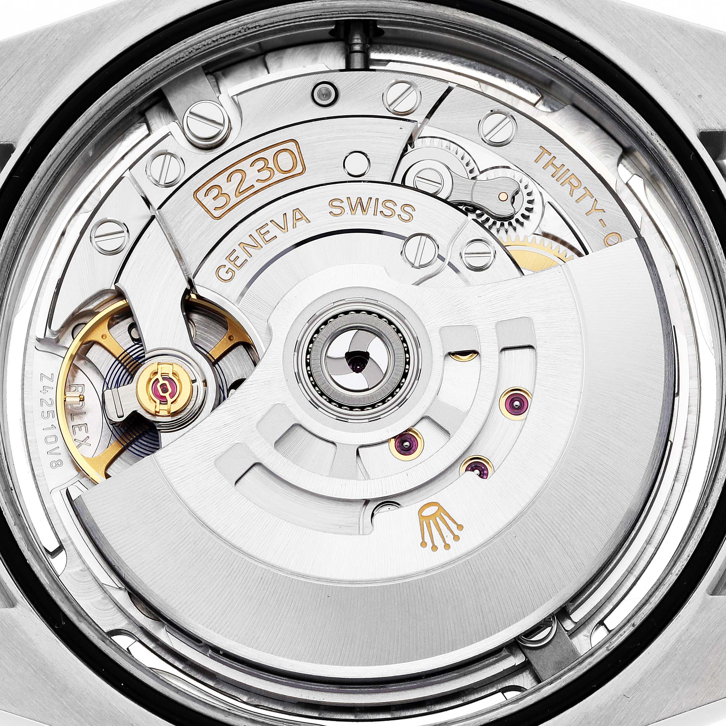 This image shows a close-up view of the Rolex Oyster Perpetual 124300 Men's Stainless Steel Silver Dial 124300 Men's Stainless Steel Silver Dial movement, highlighting the intricate mechanical components.