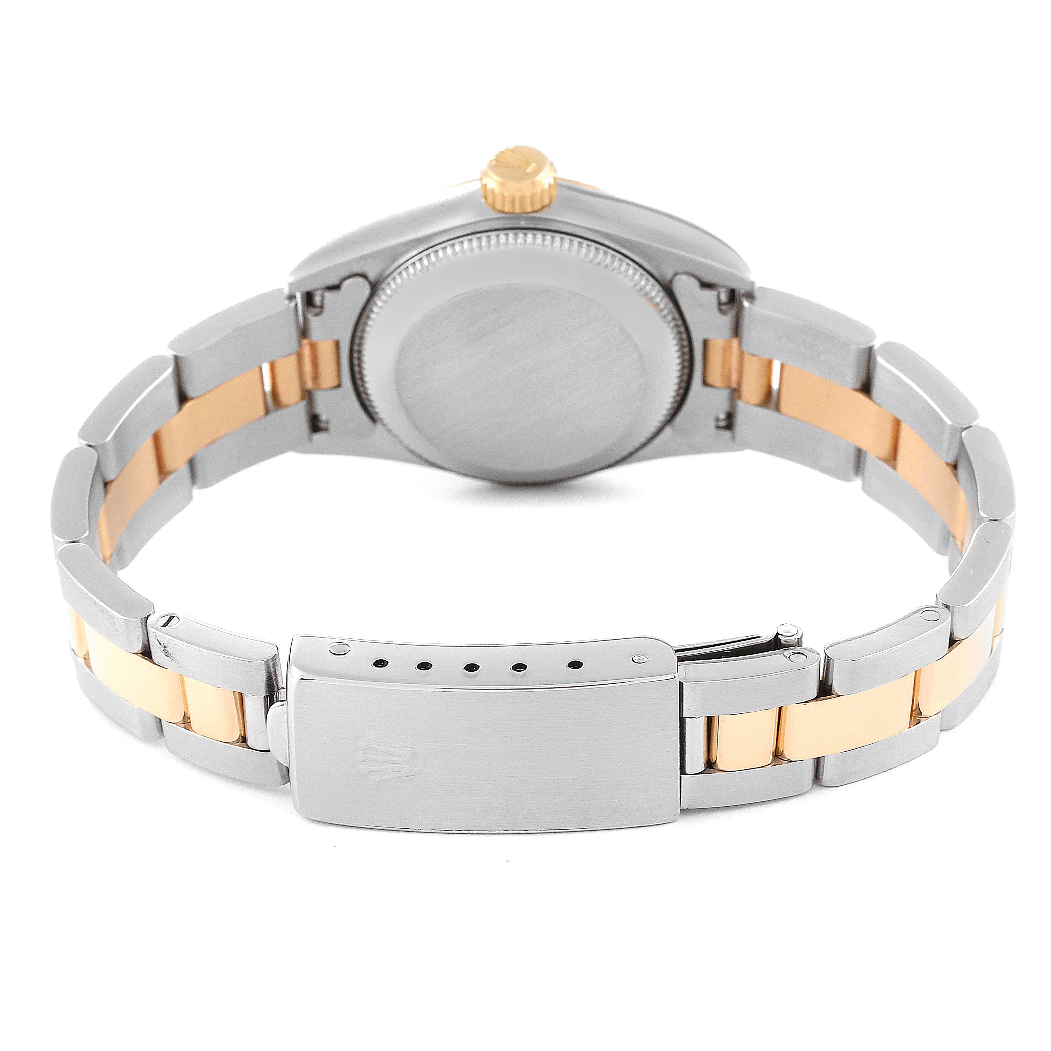 This image shows the back case and two-tone bracelet of a Rolex Oyster Perpetual 67193 Women's Steel and Gold (two tone) Champagne Dial 67193 Women's Steel and Gold (two tone) Champagne Dial watch, highlighting the clasp and crown.