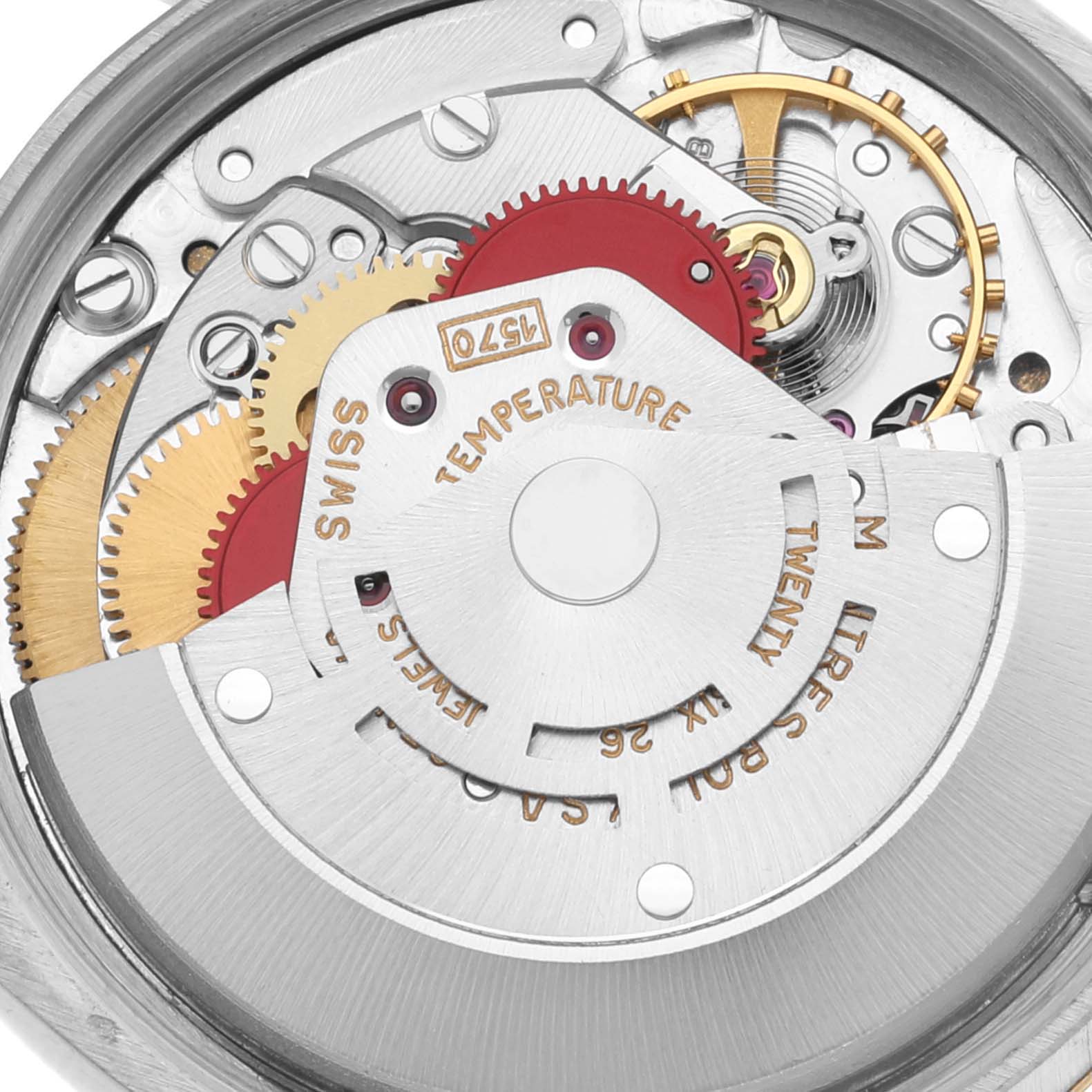 The image shows a close-up view of the movement mechanism of a Rolex Vintage Collection 1005 Men's Steel and Gold (two tone) Champagne Dial 1005 Men's Steel and Gold (two tone) Champagne Dial watch.