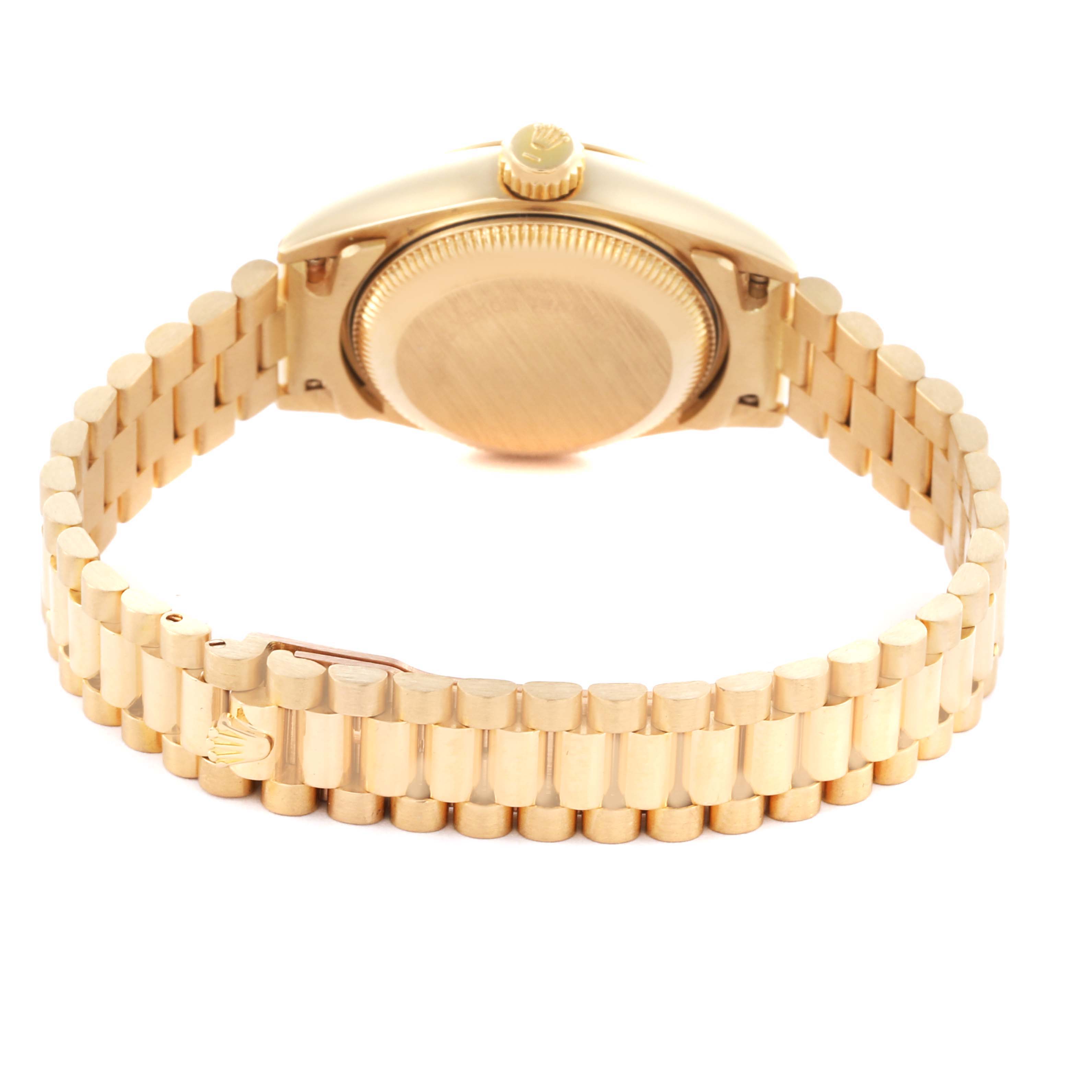 The Rolex President 69178 Women's Yellow Gold Champagne Dial 69178 Women's Yellow Gold Champagne Dial model is shown from a rear angle, featuring the case back and gold bracelet with a clasp.