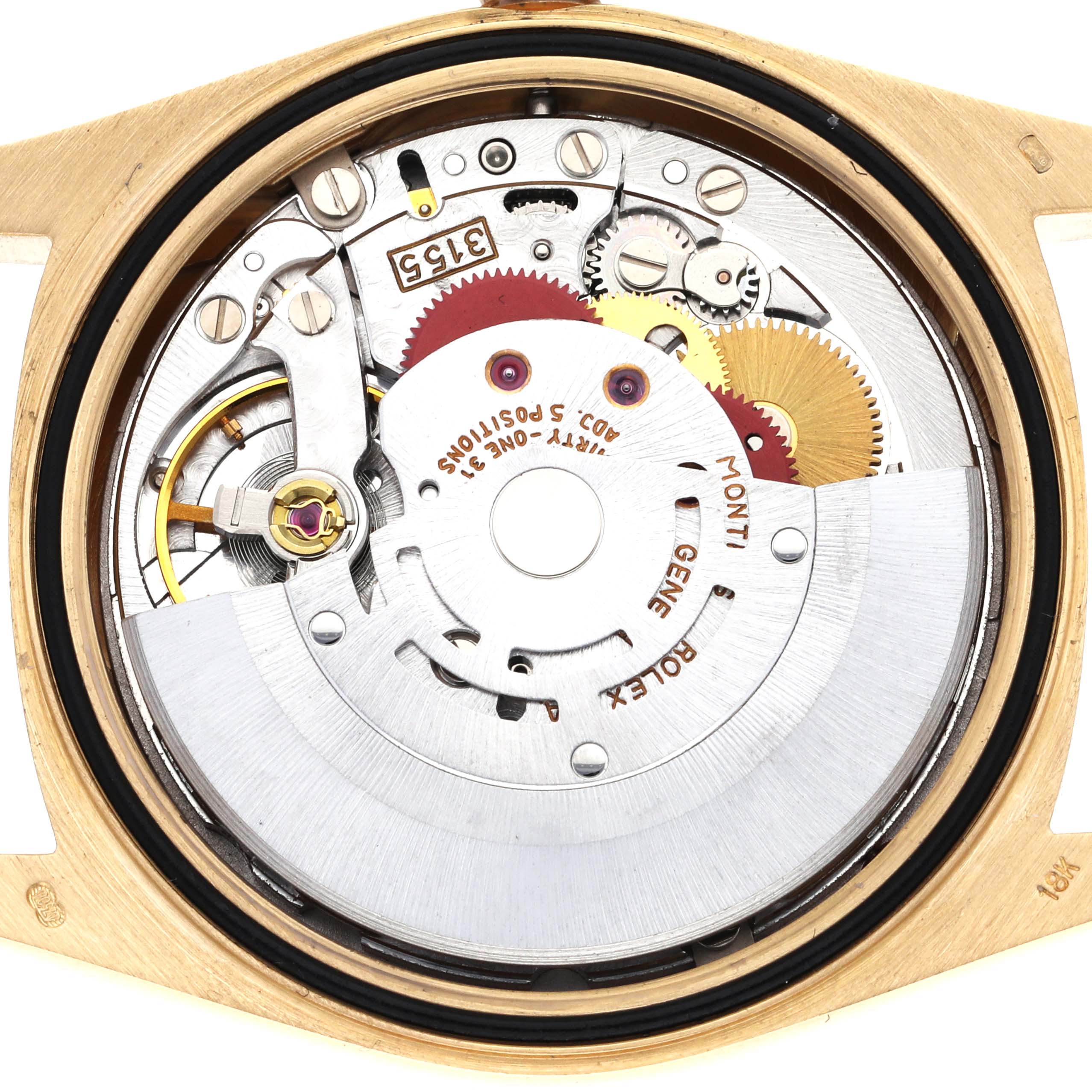 The image shows the inner movement mechanism of a Rolex President 18238 Men's Yellow Gold Champagne Dial 18238 Men's Yellow Gold Champagne Dial model from the back, highlighting gears and components.