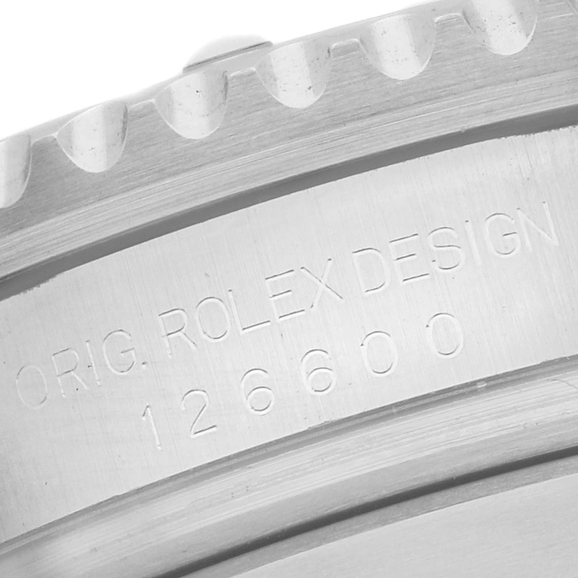 Close-up of the Rolex Sea-Dweller 126600 Men
s Stainless Steel Black Dial 126600 Men
s Stainless Steel Black Dial model 126600, showing the engraved side of the watch case and bezel.