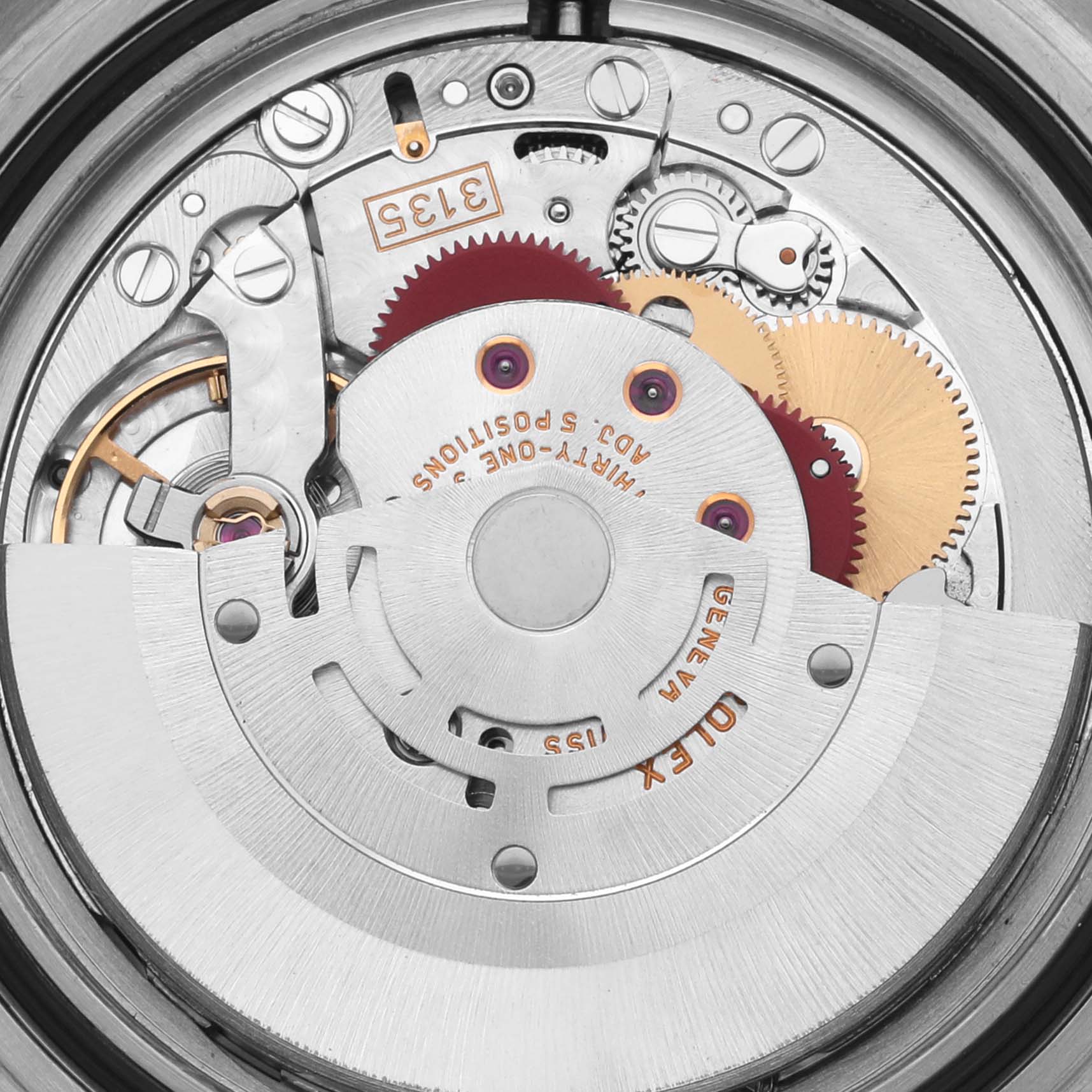 This image shows the movement of a Rolex Submariner 16613 Men's Steel and Gold (two tone) Blue Dial 16613 Men's Steel and Gold (two tone) Blue Dial watch from a top-down angle, highlighting gears and components.