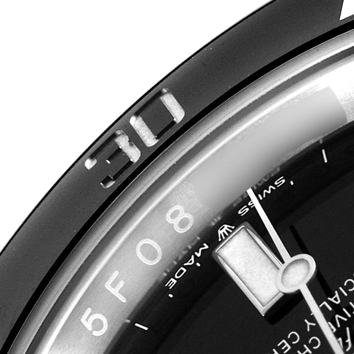 This image shows a close-up of the bezel, minute hand, and part of the dial of a Rolex Submariner 126610 Men
s Stainless Steel Black Dial 126610 Men
s Stainless Steel Black Dial watch.
