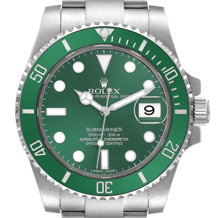 The Rolex Submariner watch is shown from a front angle, displaying the green bezel, dial, hands, and the date window.