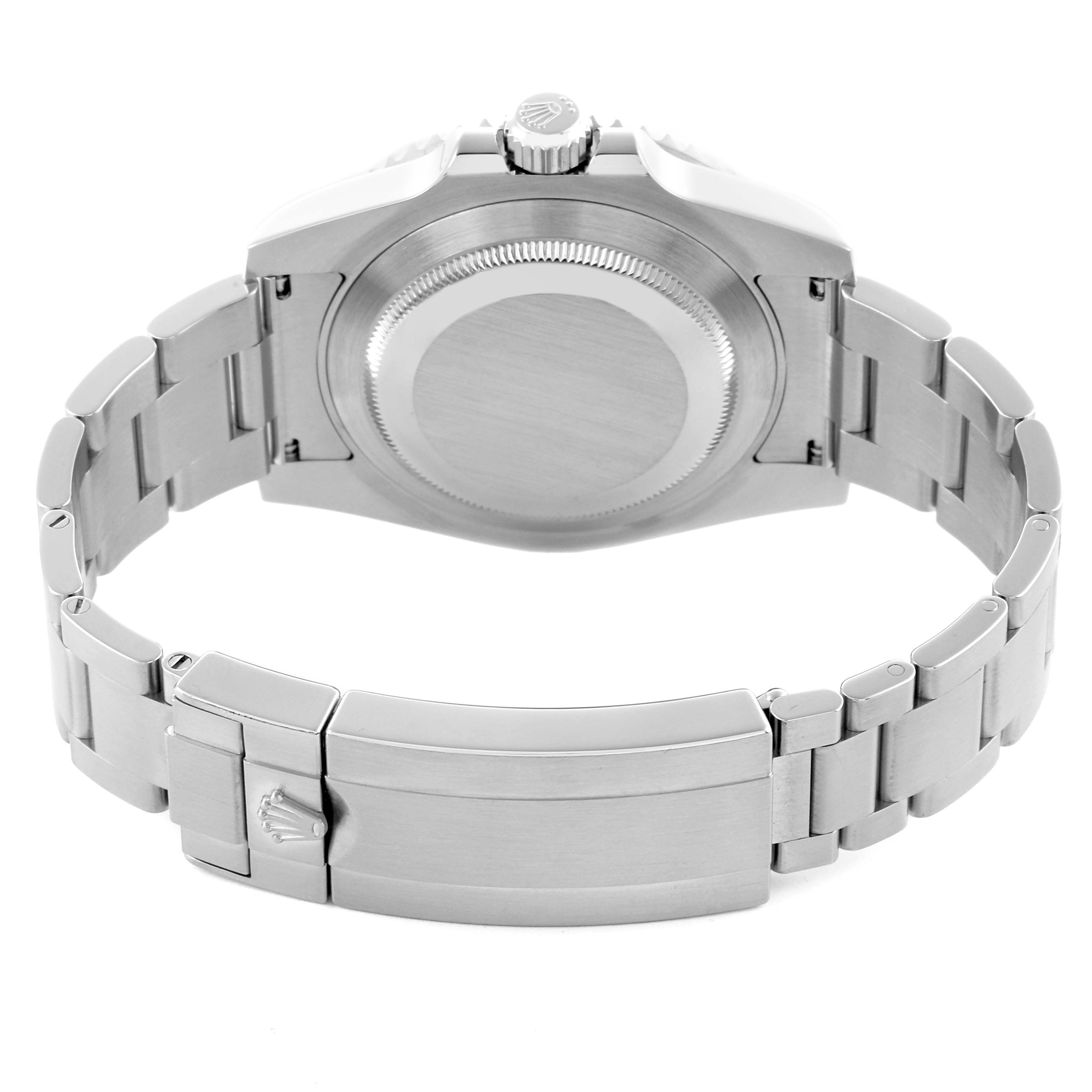 The image shows the back view of a Rolex Submariner 116610LV Men's Stainless Steel Green Dial 116610LV Men's Stainless Steel Green Dial, focusing on the case back and bracelet clasp.