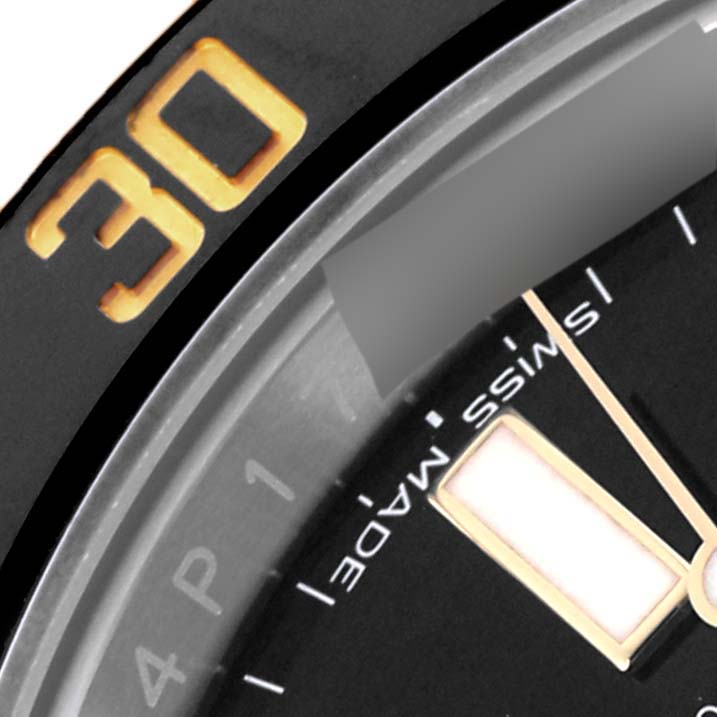 The image shows a close-up of the dial and bezel of a Rolex Submariner 116613LN Men's Steel and Gold (two tone) Black Dial 116613LN Men's Steel and Gold (two tone) Black Dial, highlighting the "30" on the bezel and a part of the dial with "Swiss Made."