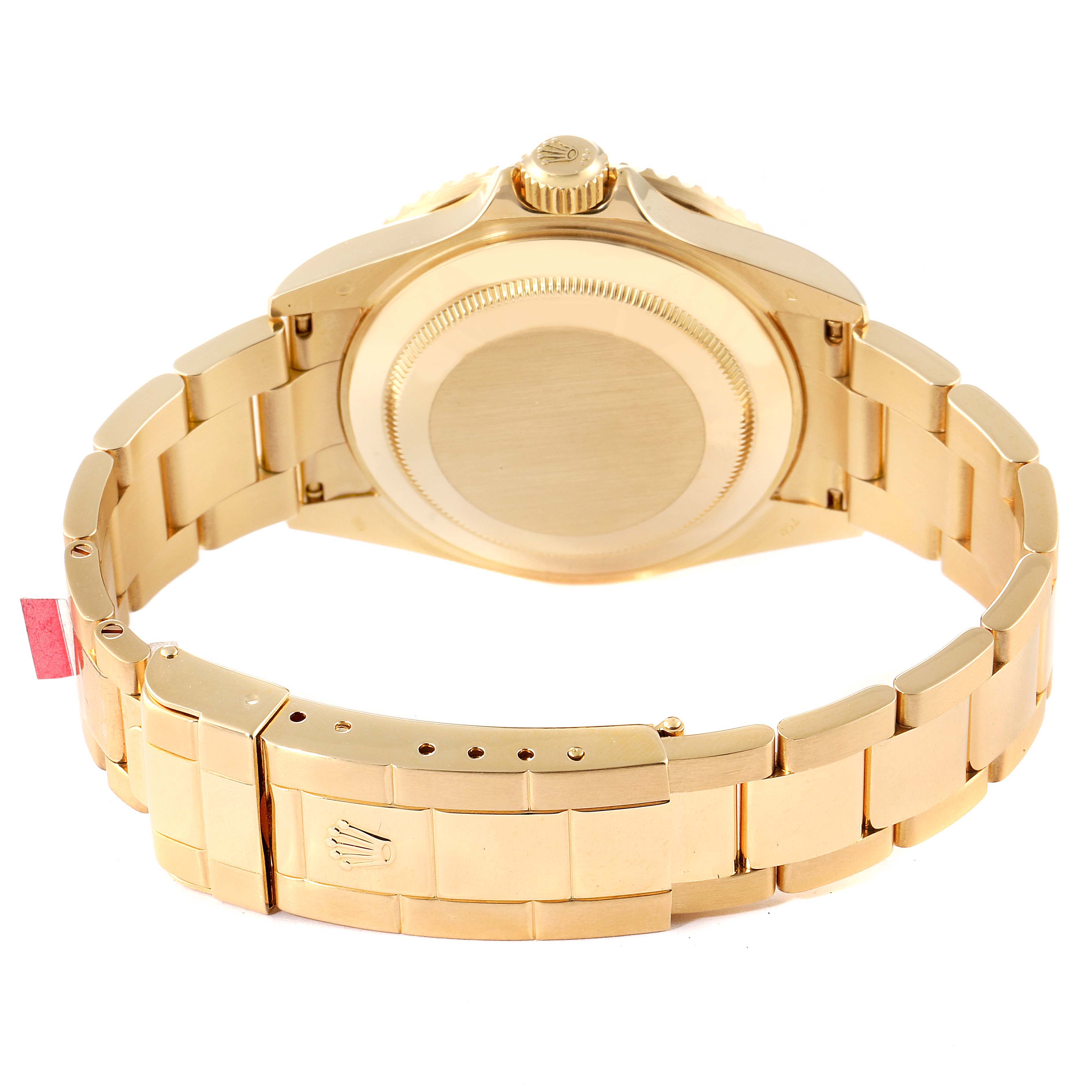 This image shows the back case and bracelet of a Rolex Submariner 16618 Men
s Yellow Gold Blue Dial 16618 Men
s Yellow Gold Blue Dial watch from a rear angle.