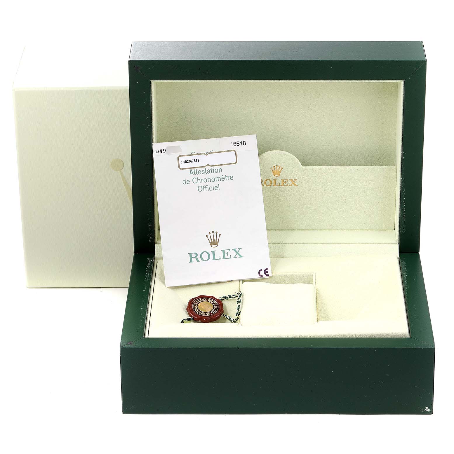 The image shows an empty Rolex Submariner 16618 Men
s Yellow Gold Blue Dial 16618 Men
s Yellow Gold Blue Dial watch box, including a certification card and tag.