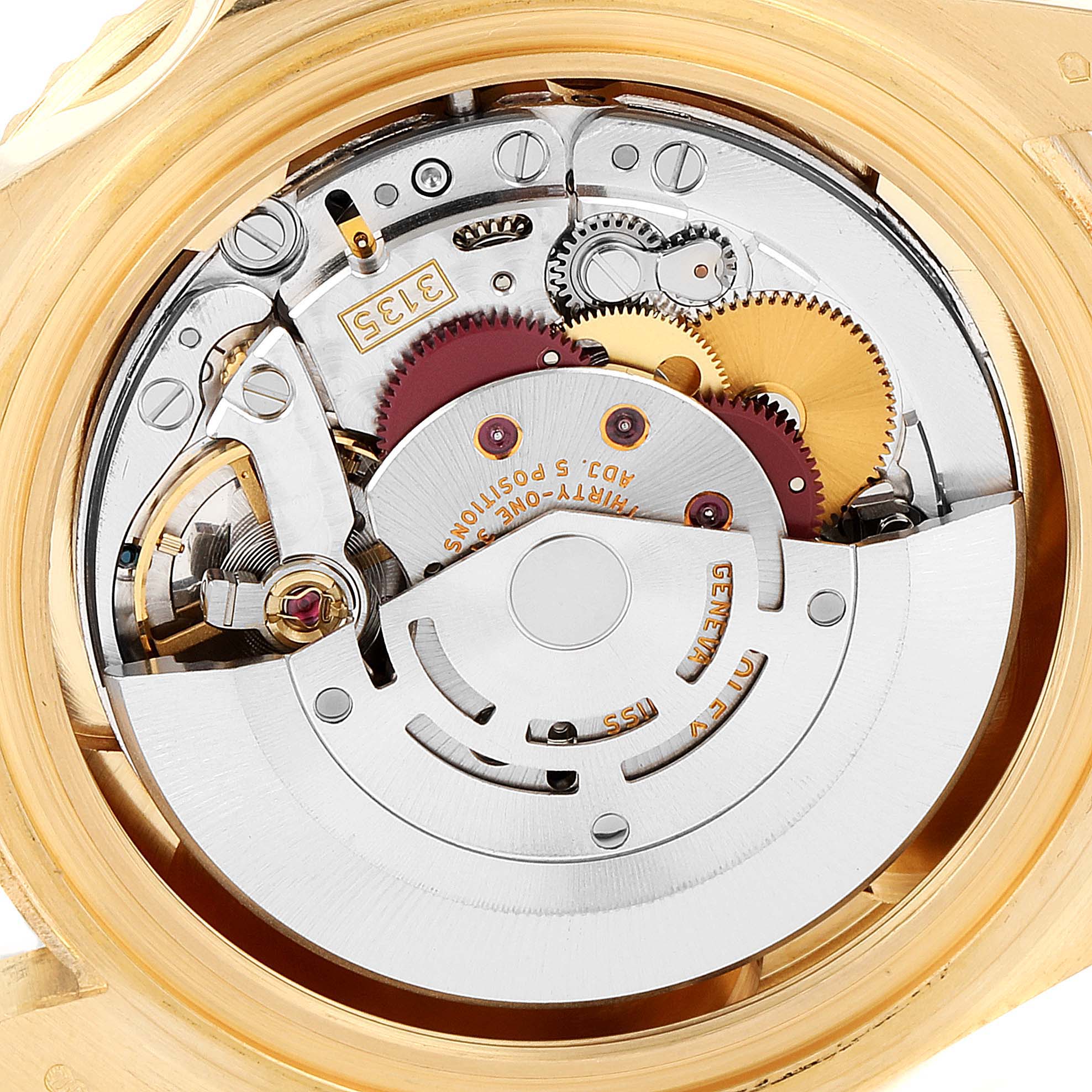 This image shows the movement mechanism of a Rolex Submariner 16618 Men
s Yellow Gold Blue Dial 16618 Men
s Yellow Gold Blue Dial watch viewed from the case back.