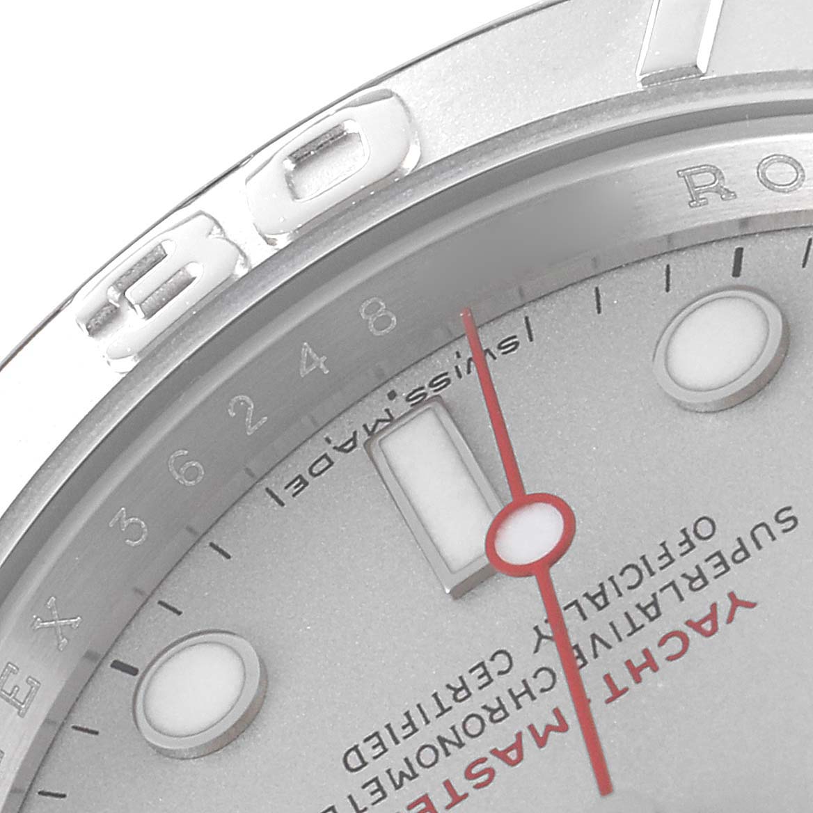 The image shows a close-up of the dial and bezel of the Rolex Yacht-Master 16622 Men
s Stainless Steel Silver Dial 16622 Men
s Stainless Steel Silver Dial watch, focusing on the hour markers, red second hand, and "Yacht-Master" text.