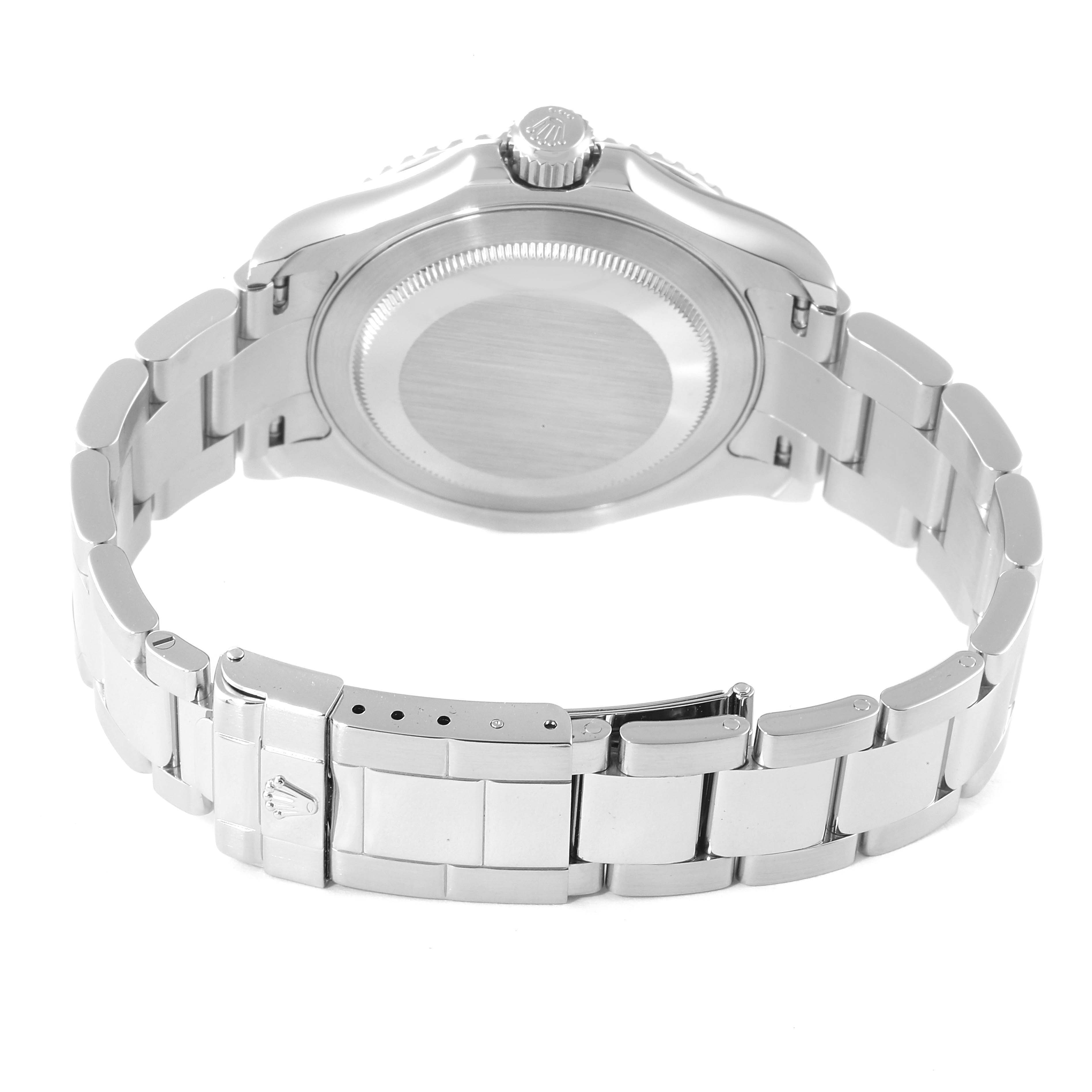 The image shows the back view of the Rolex Yacht-Master 16622 Men
s Stainless Steel Silver Dial 16622 Men
s Stainless Steel Silver Dial watch, highlighting its case back, crown, and metal bracelet with clasp.