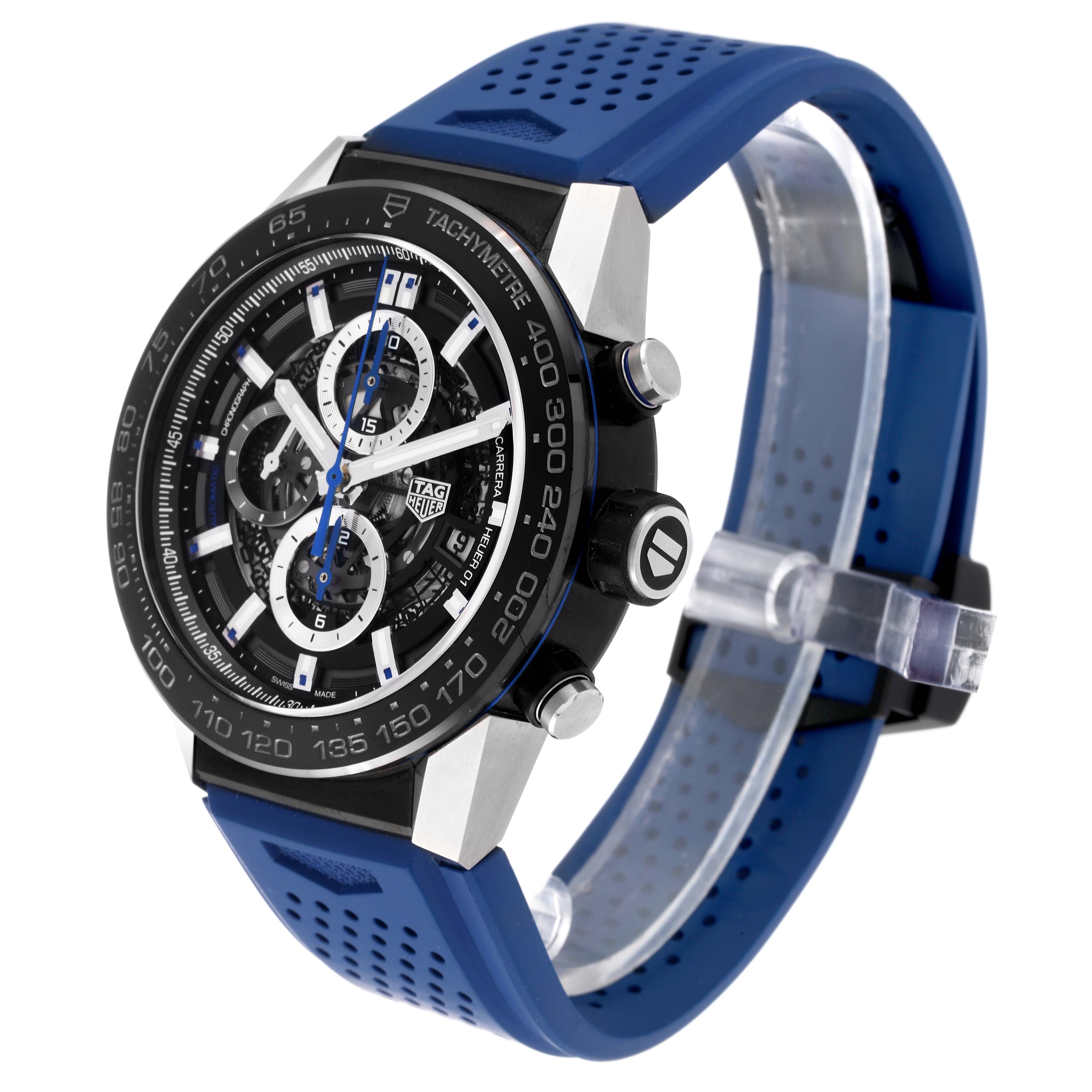 The image shows a left-side angle of the Tag Heuer Carrera CAR2A1T.FT6052 Men's Stainless Steel Black Dial CAR2A1T.FT6052 Men's Stainless Steel Black Dial watch with a blue rubber strap and visible tachymeter markings.