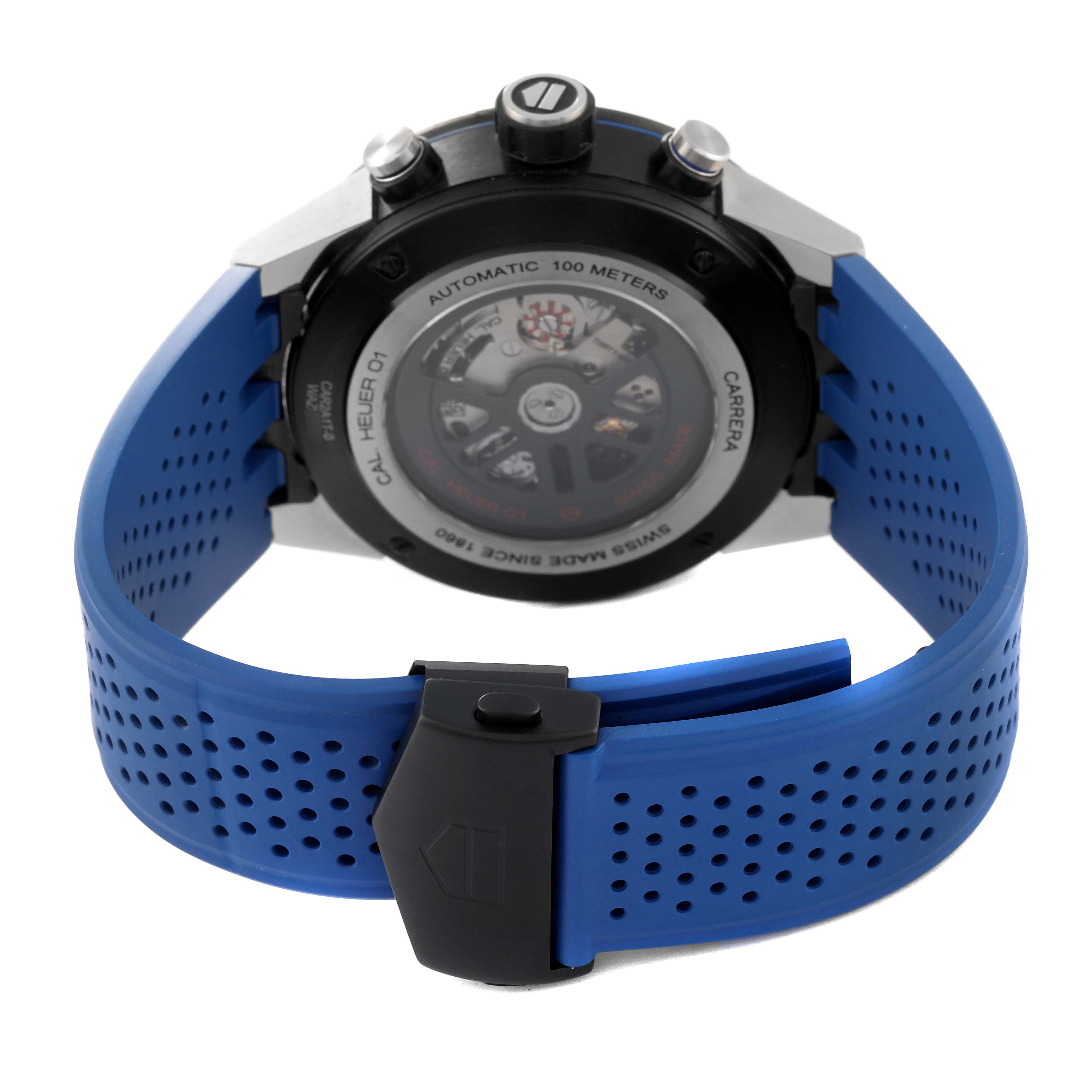 The image shows the back case and blue rubber strap of a Tag Heuer Carrera CAR2A1T.FT6052 Men's Stainless Steel Black Dial CAR2A1T.FT6052 Men's Stainless Steel Black Dial watch, highlighting its automatic mechanism.