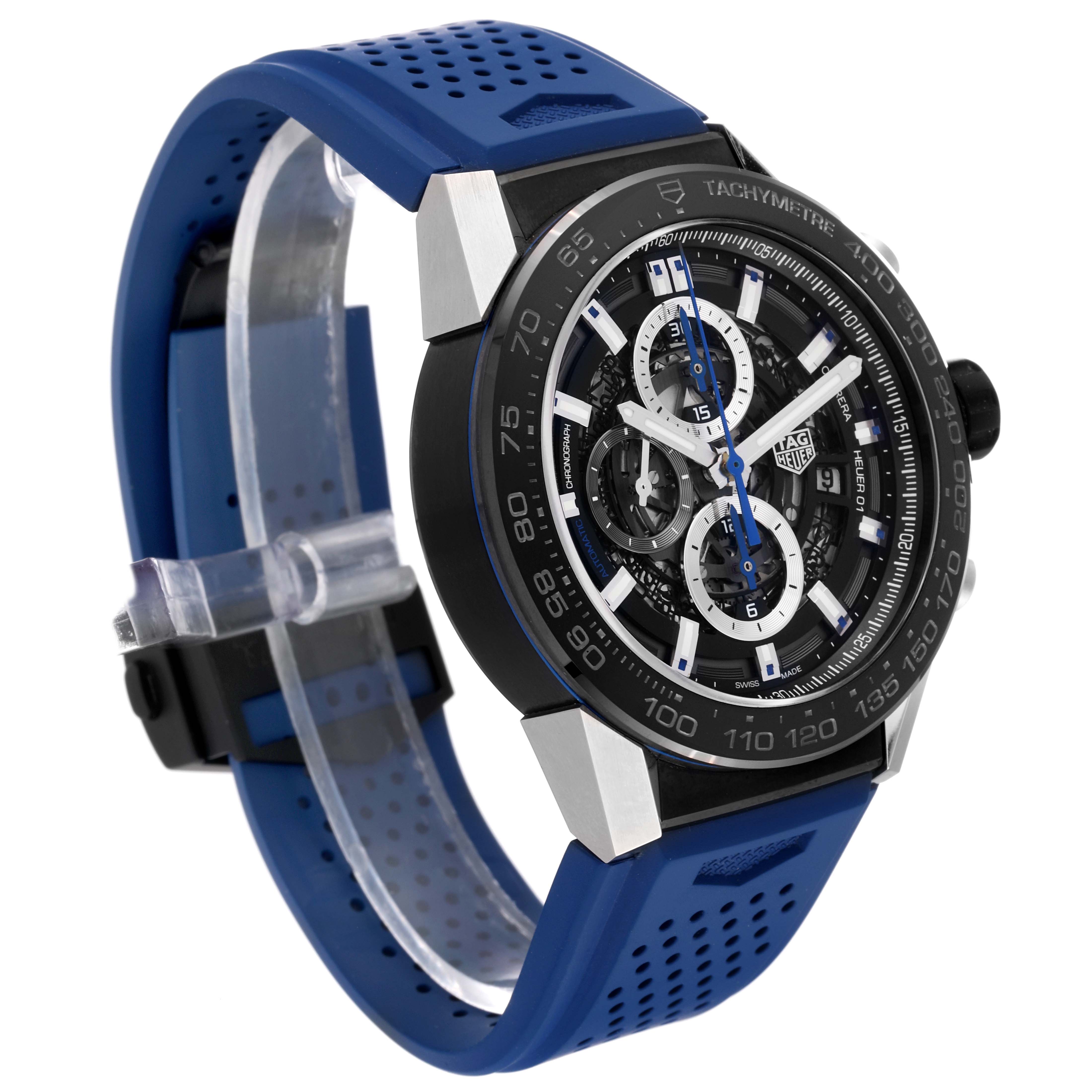 The image shows a side-angle view of a Tag Heuer Carrera CAR2A1T.FT6052 Men's Stainless Steel Black Dial CAR2A1T.FT6052 Men's Stainless Steel Black Dial watch, highlighting its blue strap and detailed black face with multiple dials.