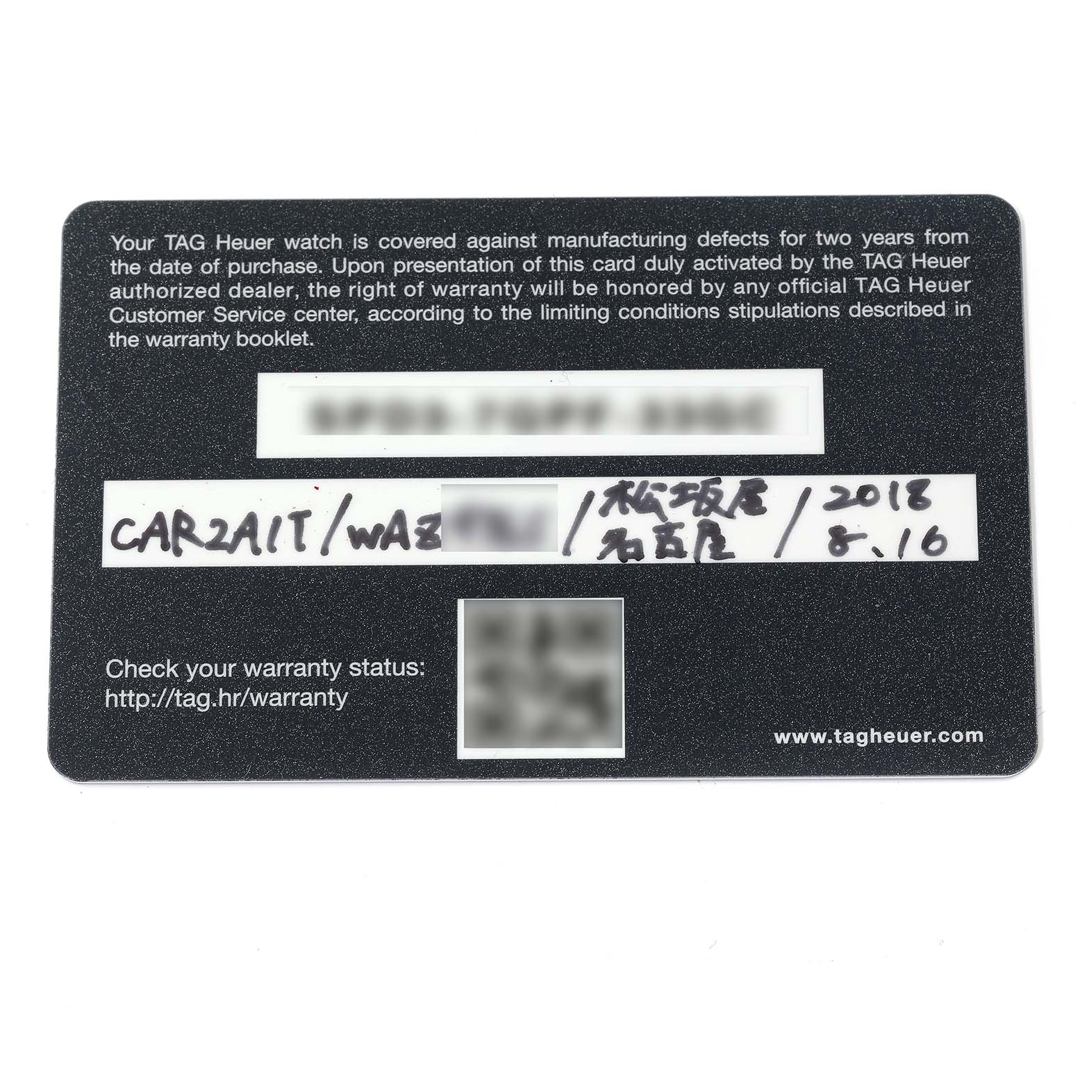 The image shows the warranty card for a Tag Heuer Carrera CAR2A1T.FT6052 Men's Stainless Steel Black Dial CAR2A1T.FT6052 Men's Stainless Steel Black Dial watch, detailing warranty terms and model information.