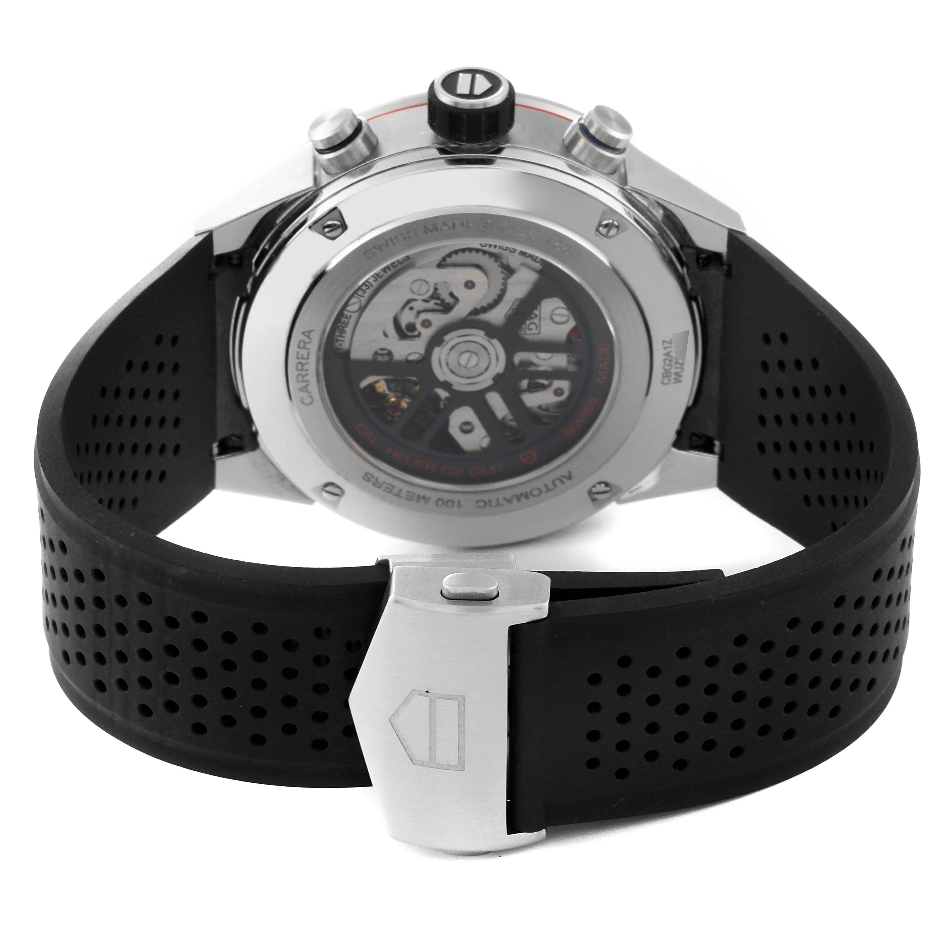 The image shows the back view of the Tag Heuer Carrera CBG2A1Z.BA0658 Men's Stainless Steel Black Dial CBG2A1Z.BA0658 Men's Stainless Steel Black Dial model watch, highlighting its movement mechanism and black rubber strap.