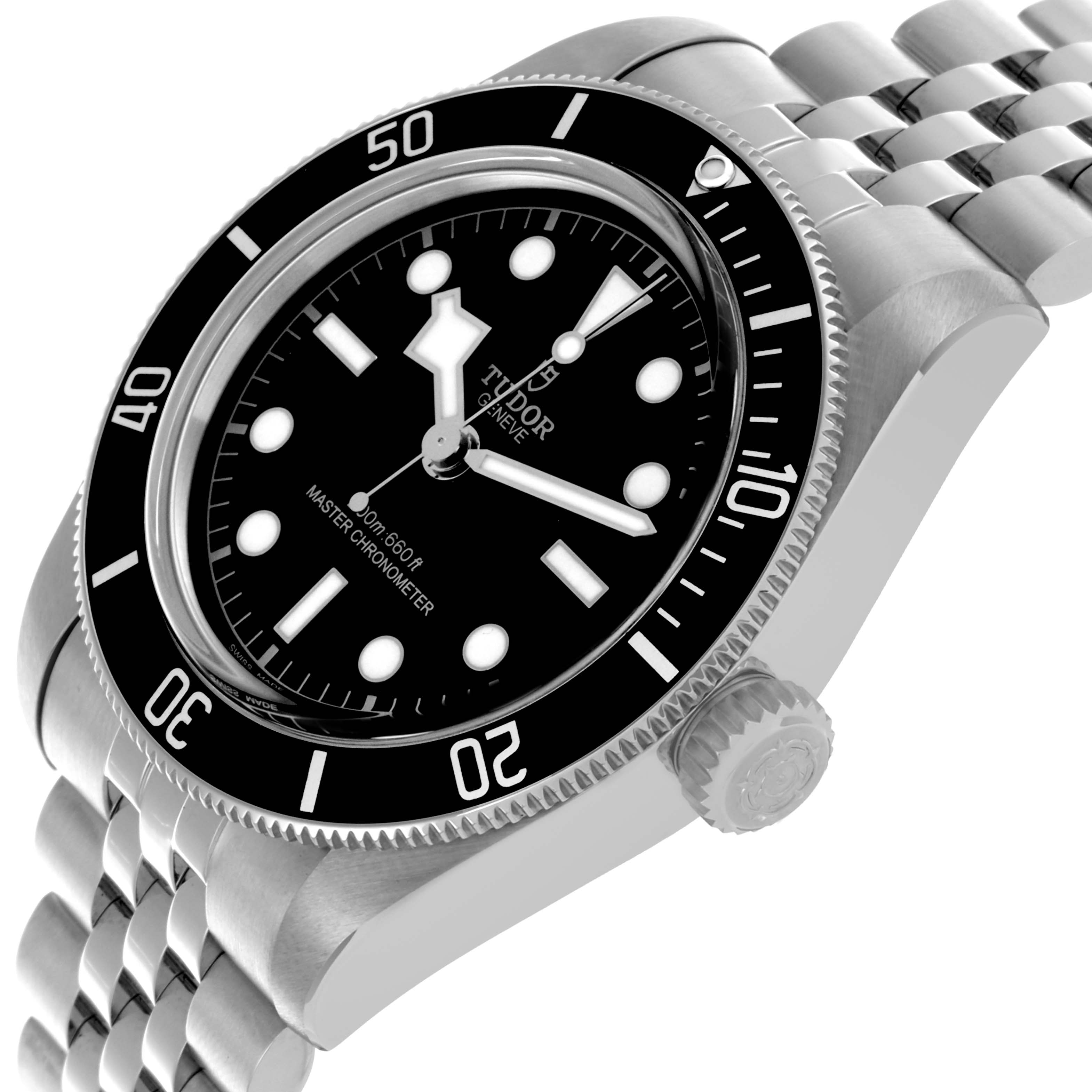The Tudor Heritage Black Bay 7941A1A0NU Men's Stainless Steel Black Dial 7941A1A0NU Men's Stainless Steel Black Dial watch is shown at an angled view, highlighting the bezel, dial, crown, and bracelet.
