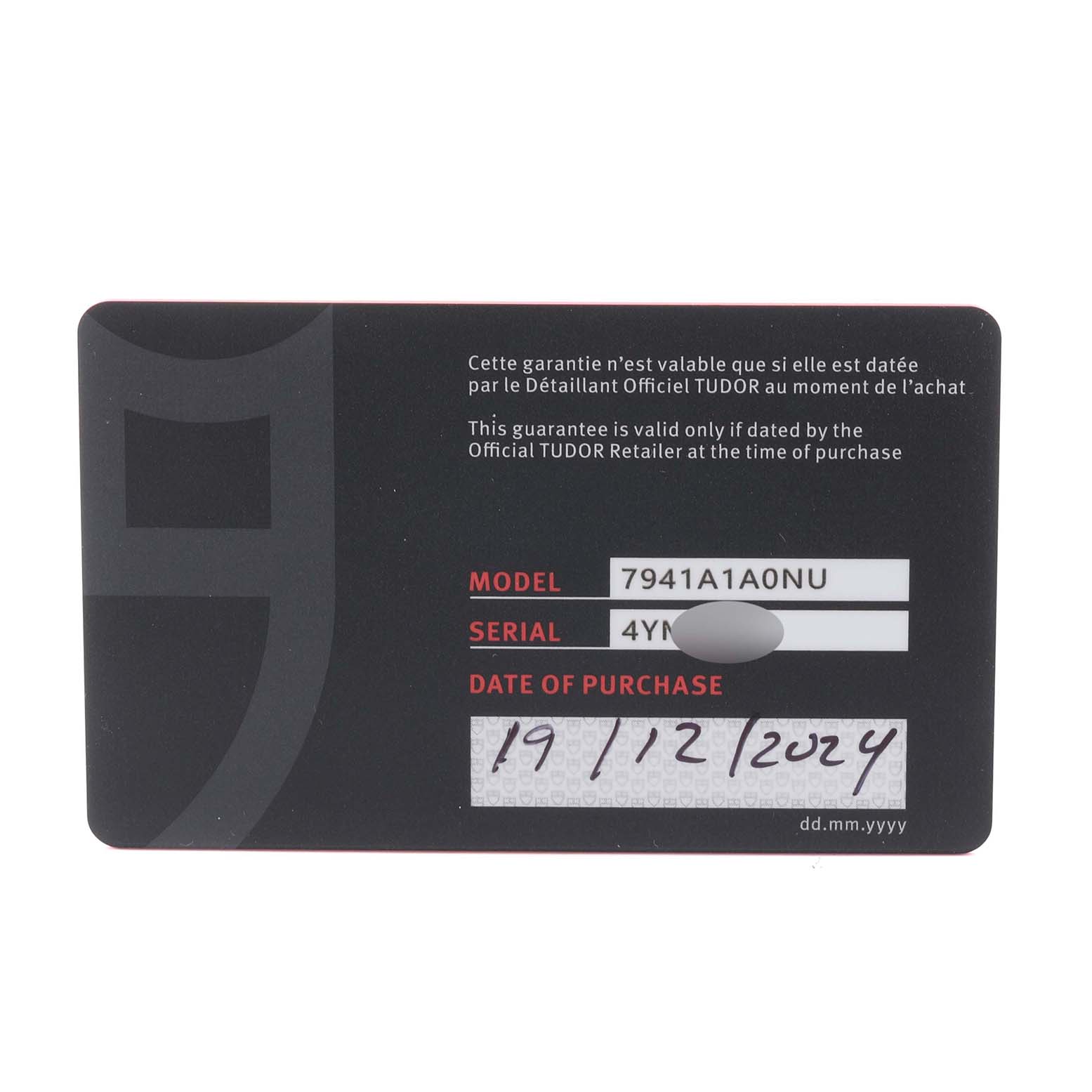 The image shows a Tudor Heritage Black Bay 7941A1A0NU Men's Stainless Steel Black Dial 7941A1A0NU Men's Stainless Steel Black Dial warranty card featuring model and serial numbers and the date of purchase.