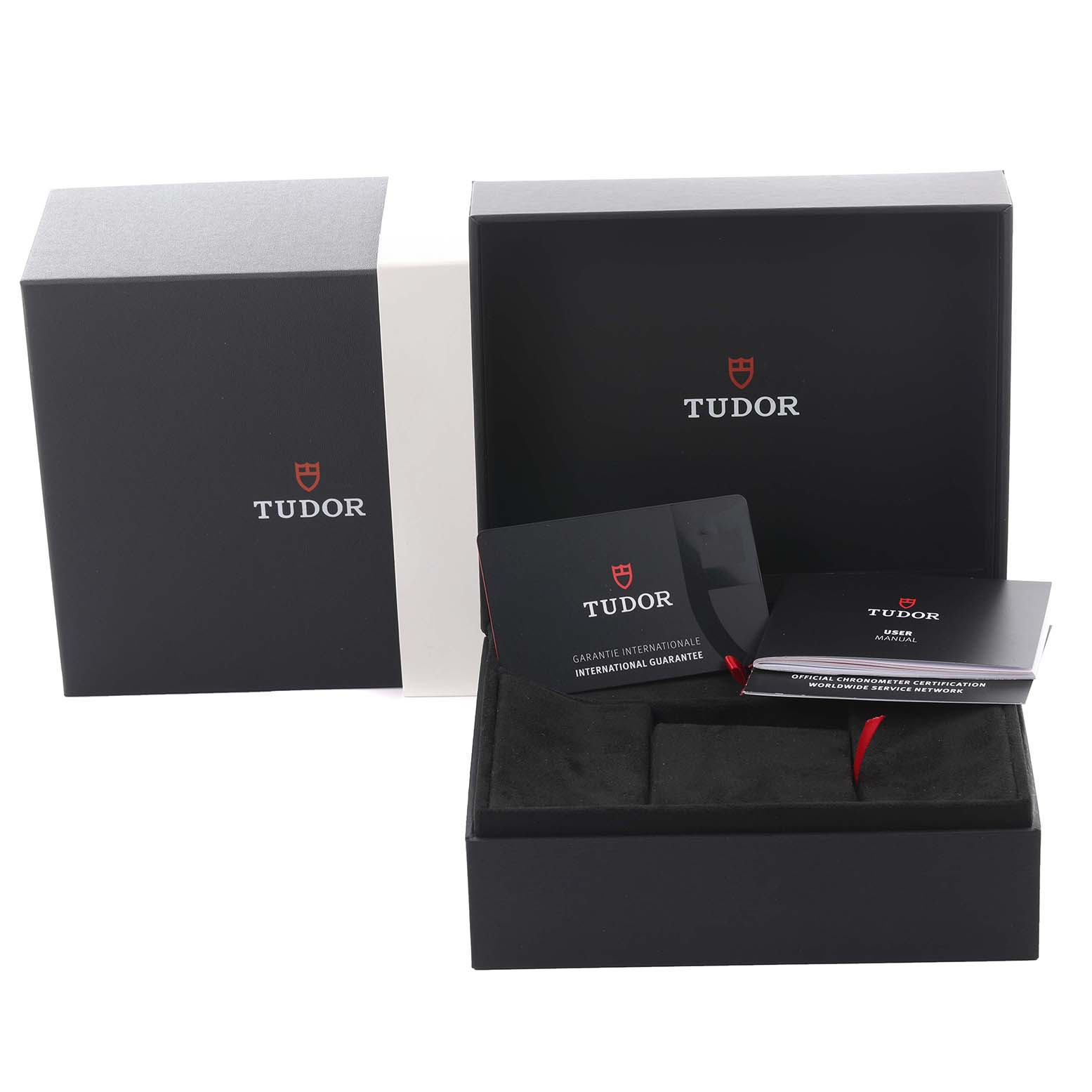 The image shows Tudor Heritage Black Bay 7941A1A0NU Men's Stainless Steel Black Dial 7941A1A0NU Men's Stainless Steel Black Dial packaging and accessories, including boxes and guarantee cards, viewed from the front.