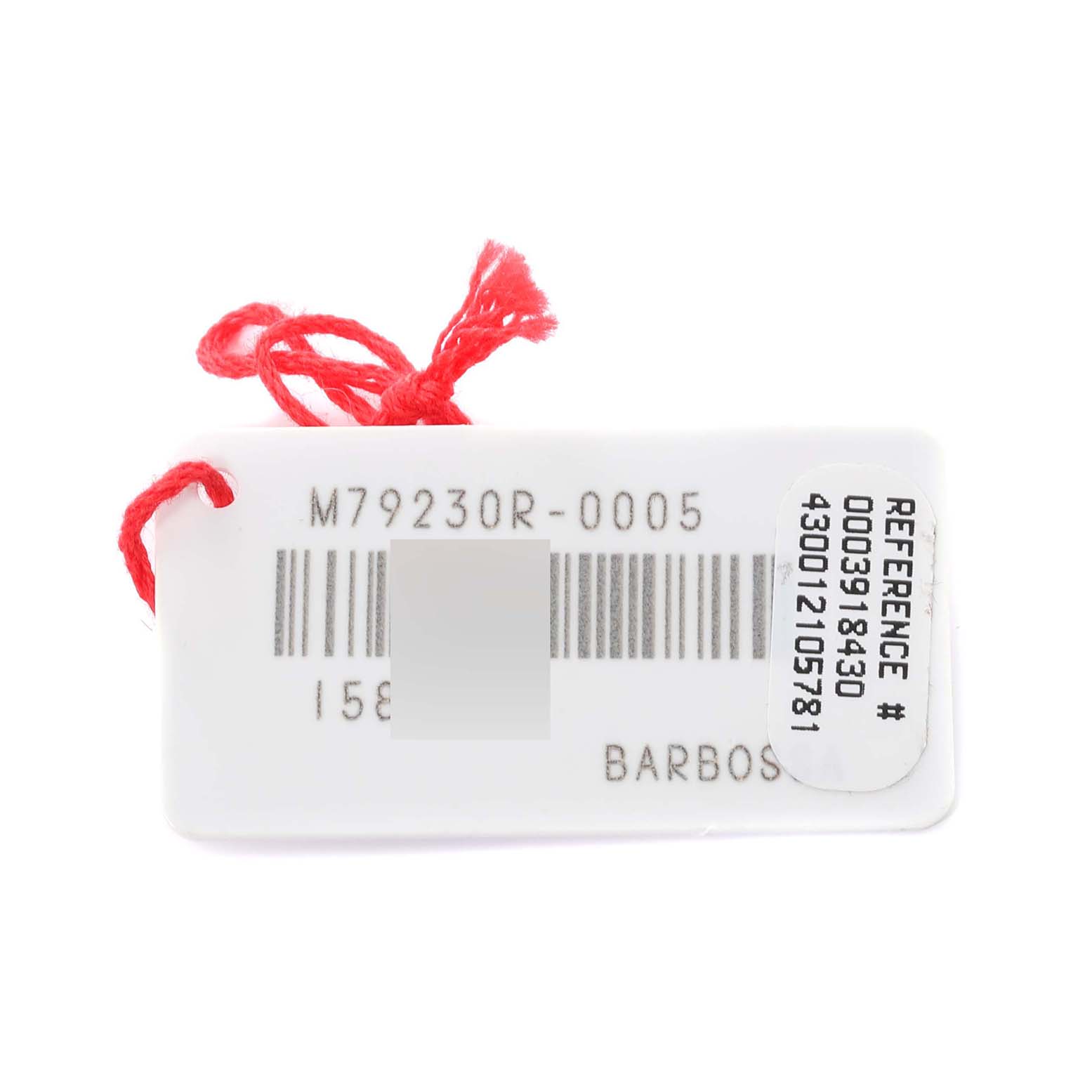 The image shows a tag with a red string indicating the model and reference number of a Tudor Heritage Black Bay 79230R Men
s Stainless Steel Black Dial 79230R Men
s Stainless Steel Black Dial watch.