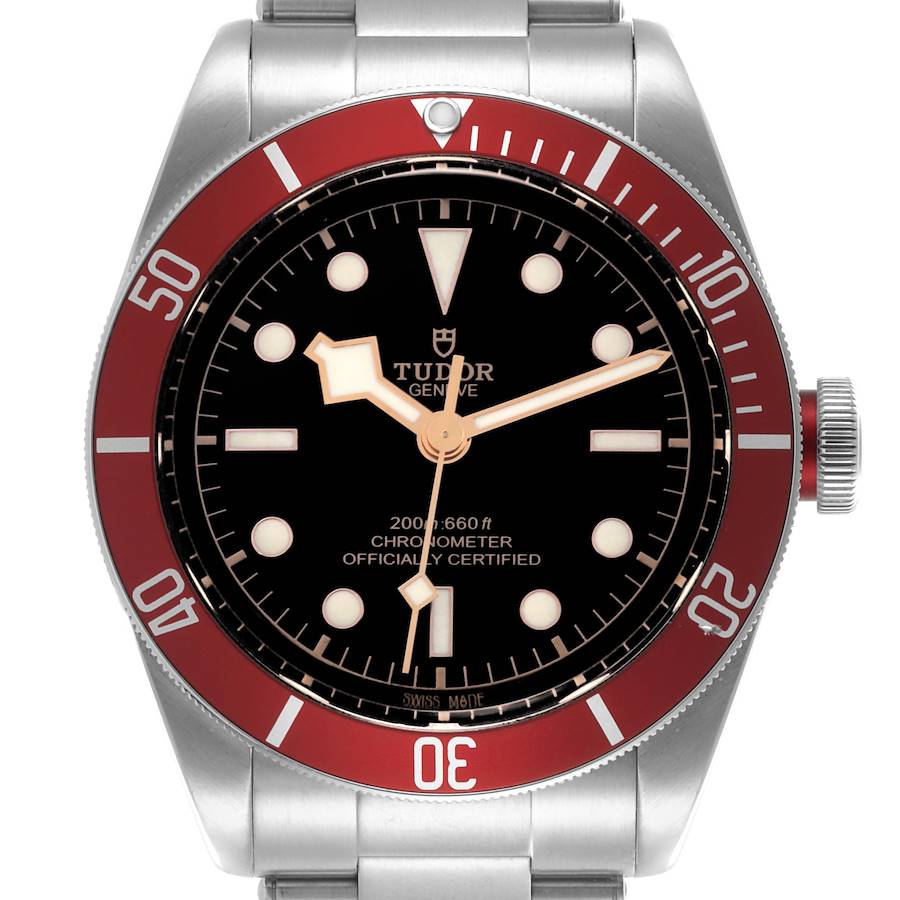 The Tudor Heritage Black Bay watch is shown from a front view, highlighting the bezel, dial, and crown.