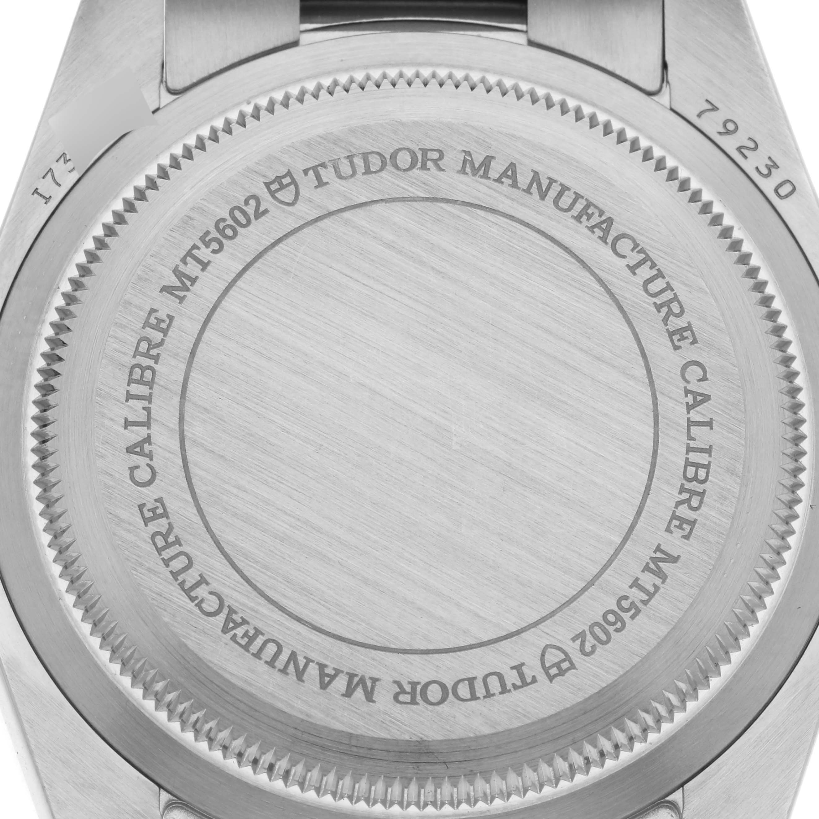 The image shows the back case of the Tudor Heritage Black Bay 79230R-0003 Men's Stainless Steel Black Dial 79230R-0003 Men's Stainless Steel Black Dial watch, highlighting its engraved details.