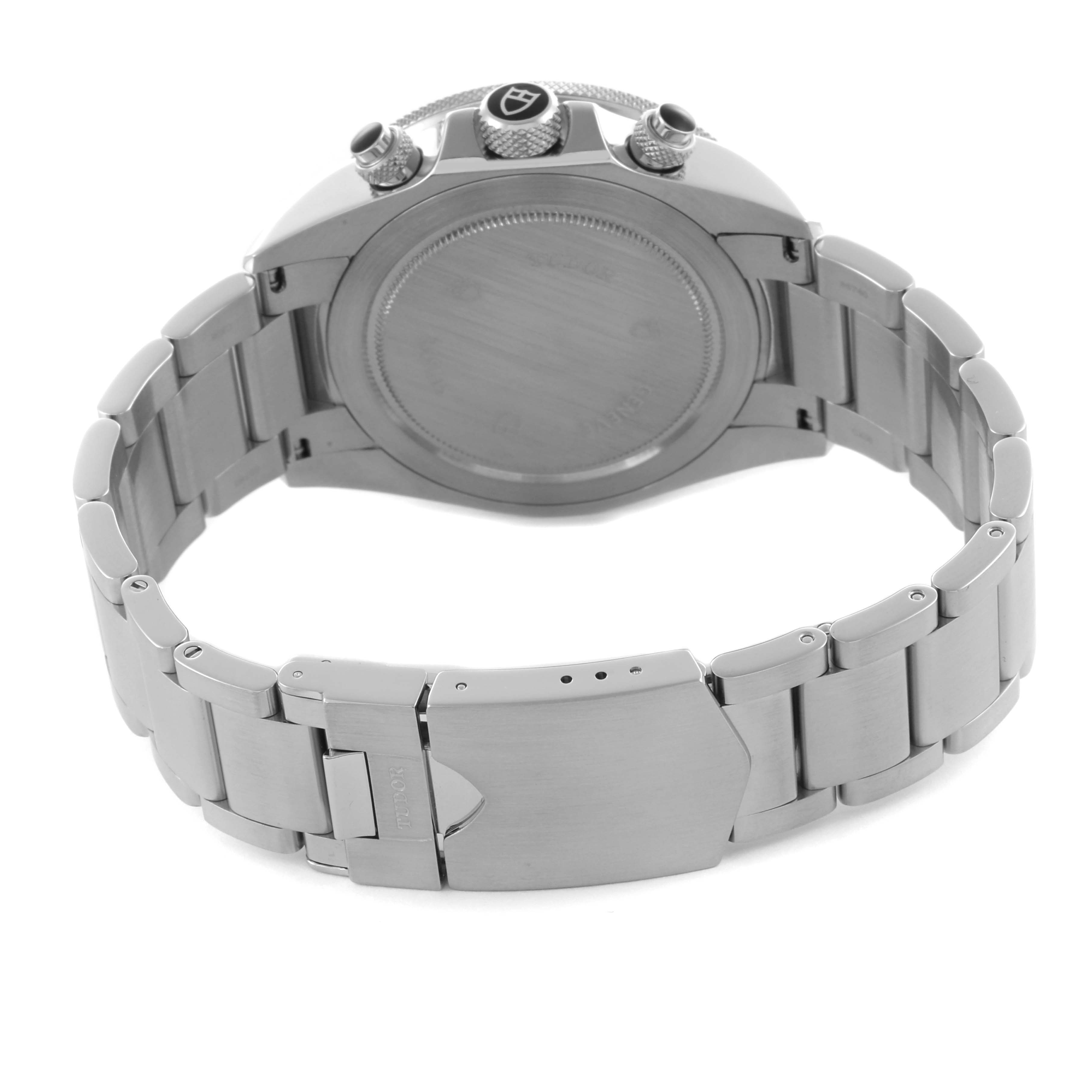 The image shows the Tudor Heritage Chrono 70330N-65740 Men's Stainless Steel Grey Dial 70330N-65740 Men's Stainless Steel Grey Dial from the back, highlighting the case back, bracelet, and clasp.