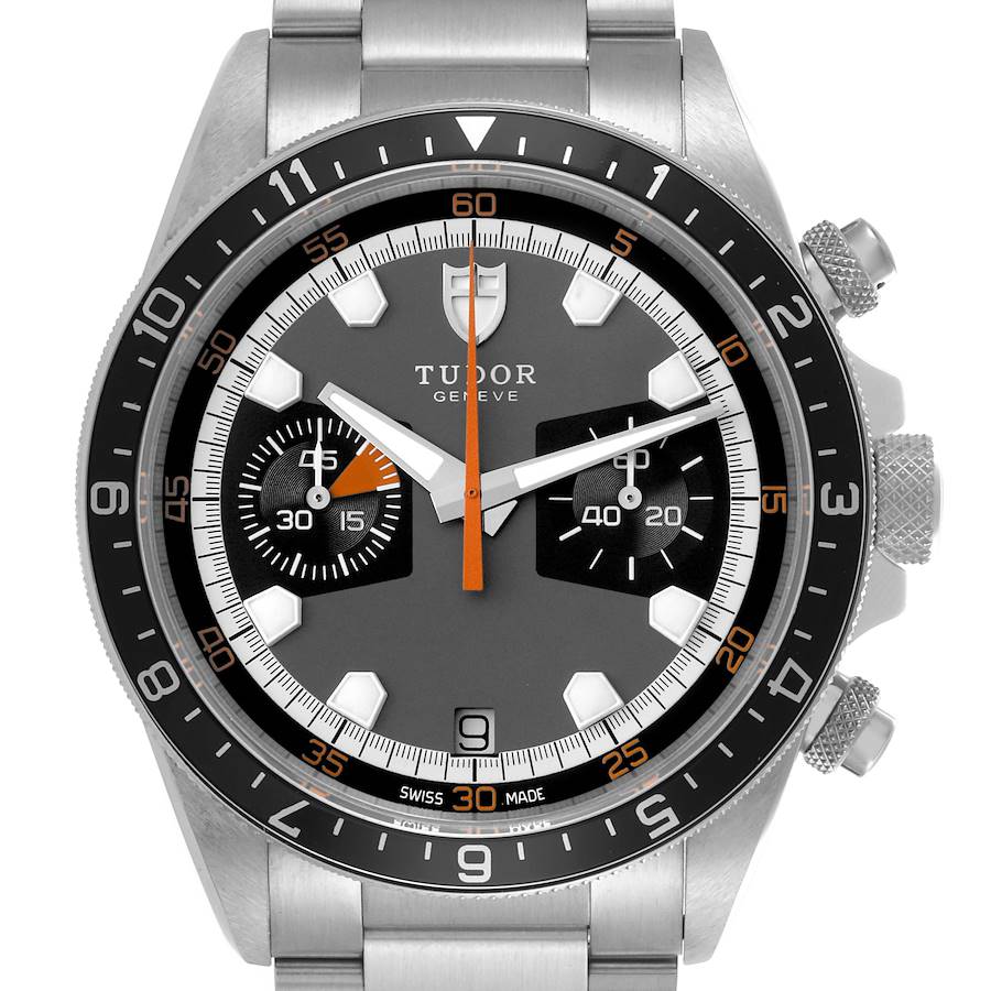 The Tudor Heritage Chrono watch is shown from the front, highlighting its dial, bezel, sub-dials, and crown.