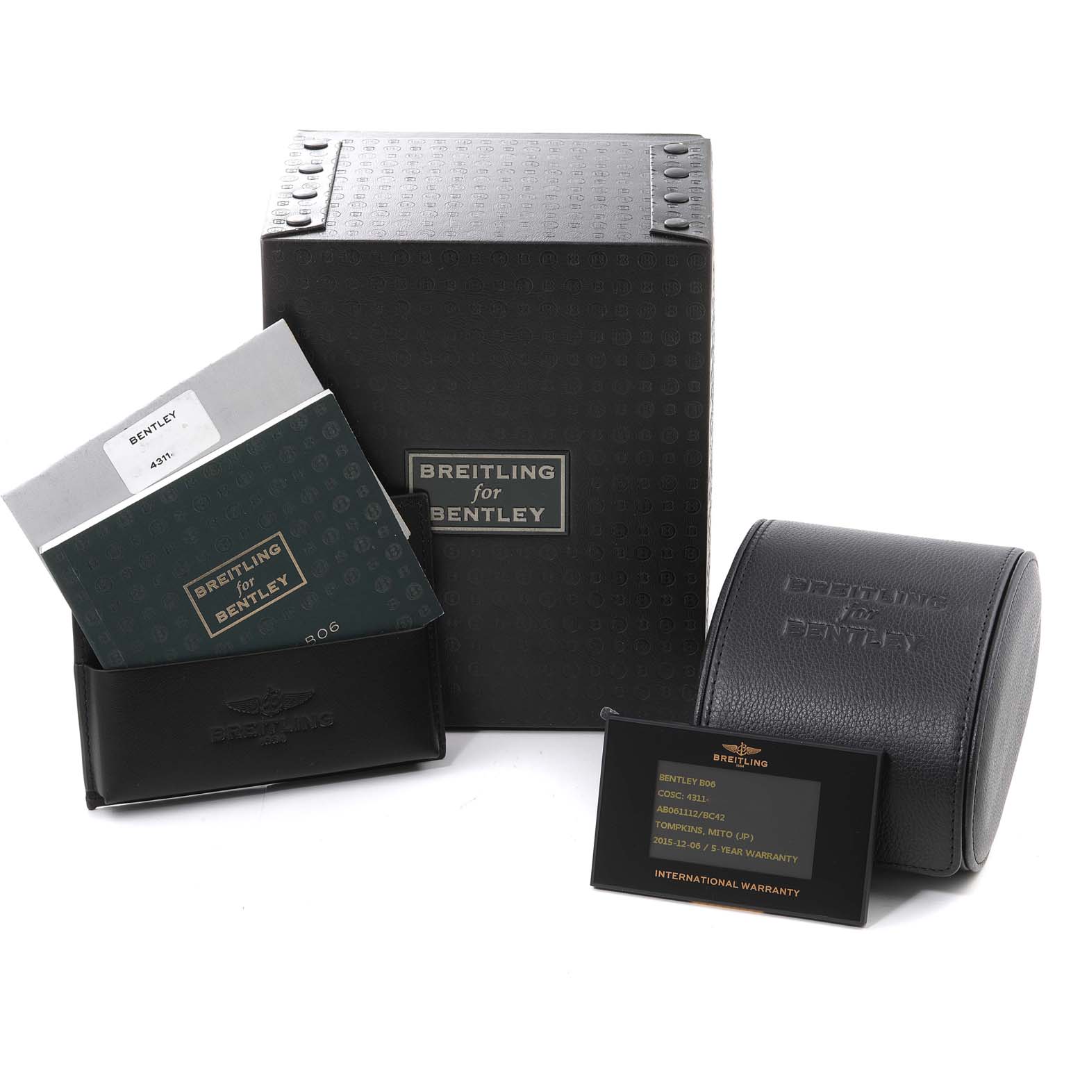 The image shows the box, manuals, warranty card, and watch case for the Breitling for Bentley model.
