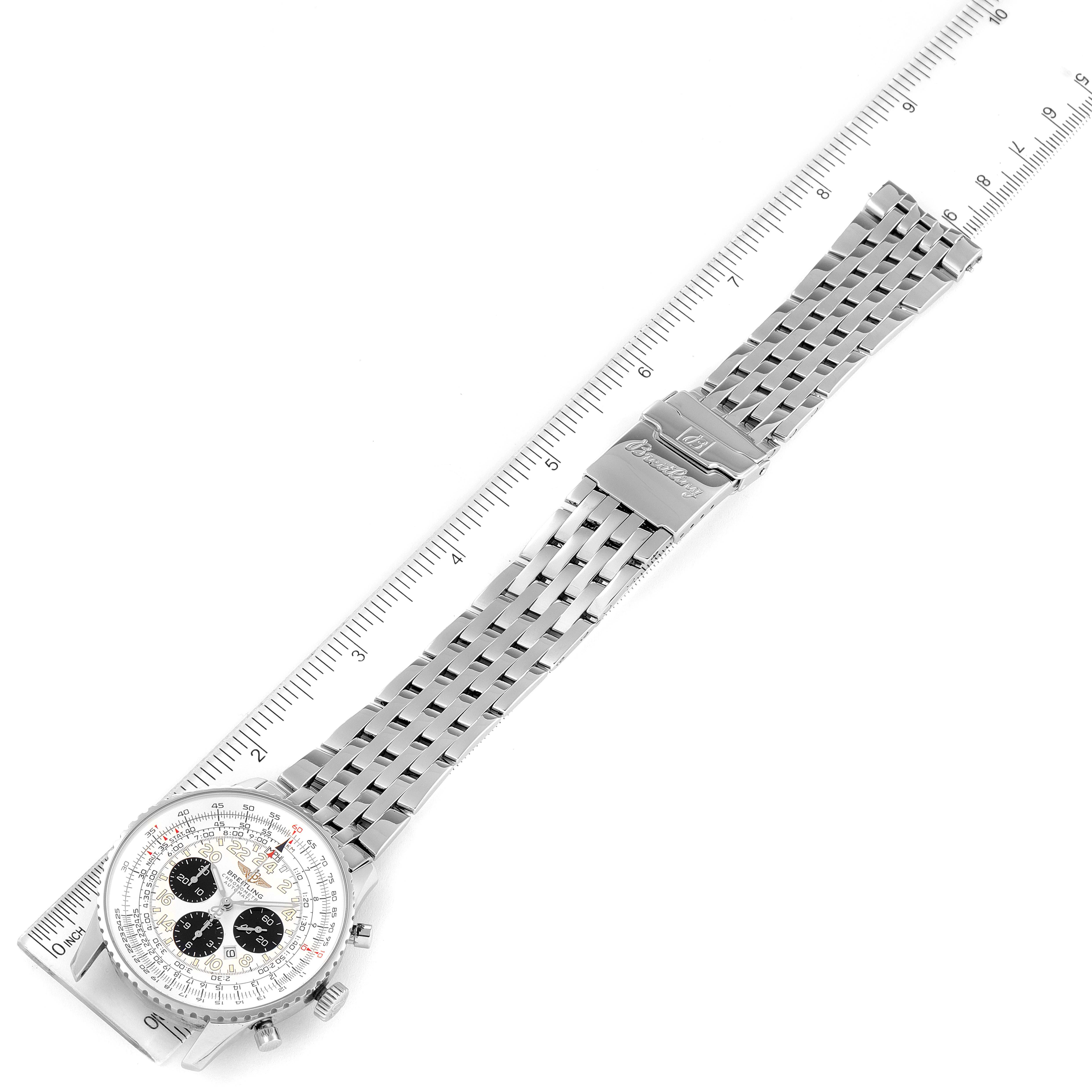 The image shows the Breitling Navitimer A22322 Men
s Stainless Steel Silver Dial A22322 Men
s Stainless Steel Silver Dial watch laid flat with its bracelet and clasp, with a ruler for scale.