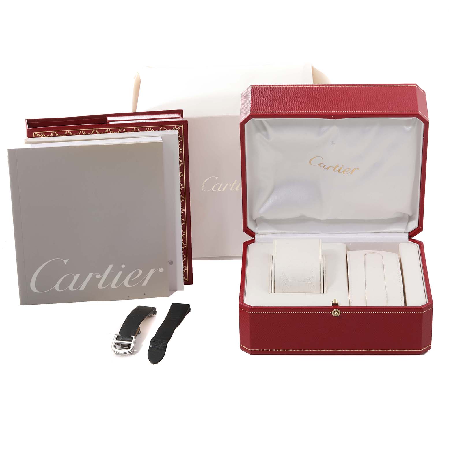 The image shows a Cartier Roadster W62016V3 Women
s Stainless Steel Silver Dial W62016V3 Women
s Stainless Steel Silver Dial watch box, including instructions, a strap, and the red watch case with white interior compartments.
