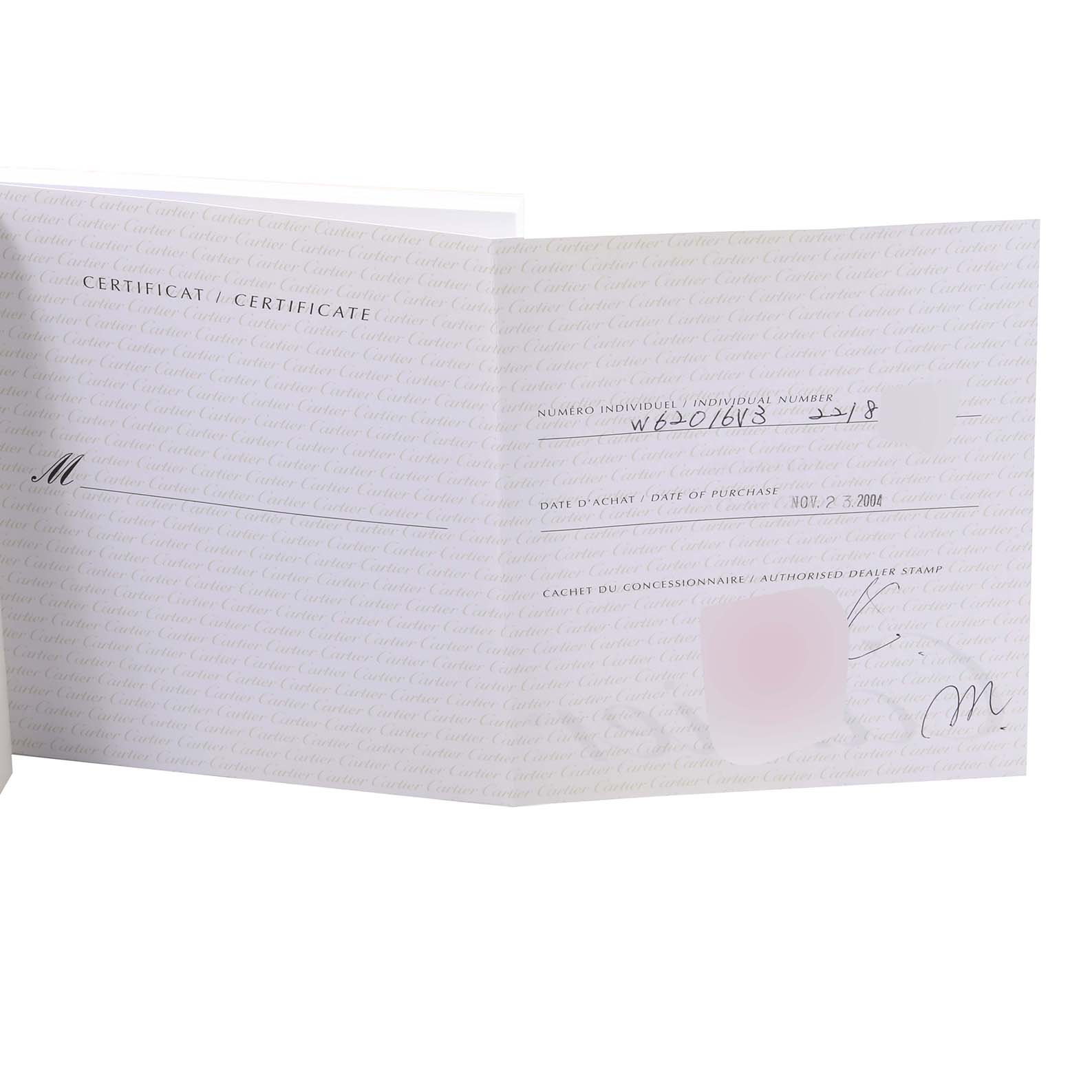 The image shows an open warranty card for the Cartier Roadster W62016V3 Women
s Stainless Steel Silver Dial W62016V3 Women
s Stainless Steel Silver Dial model watch.