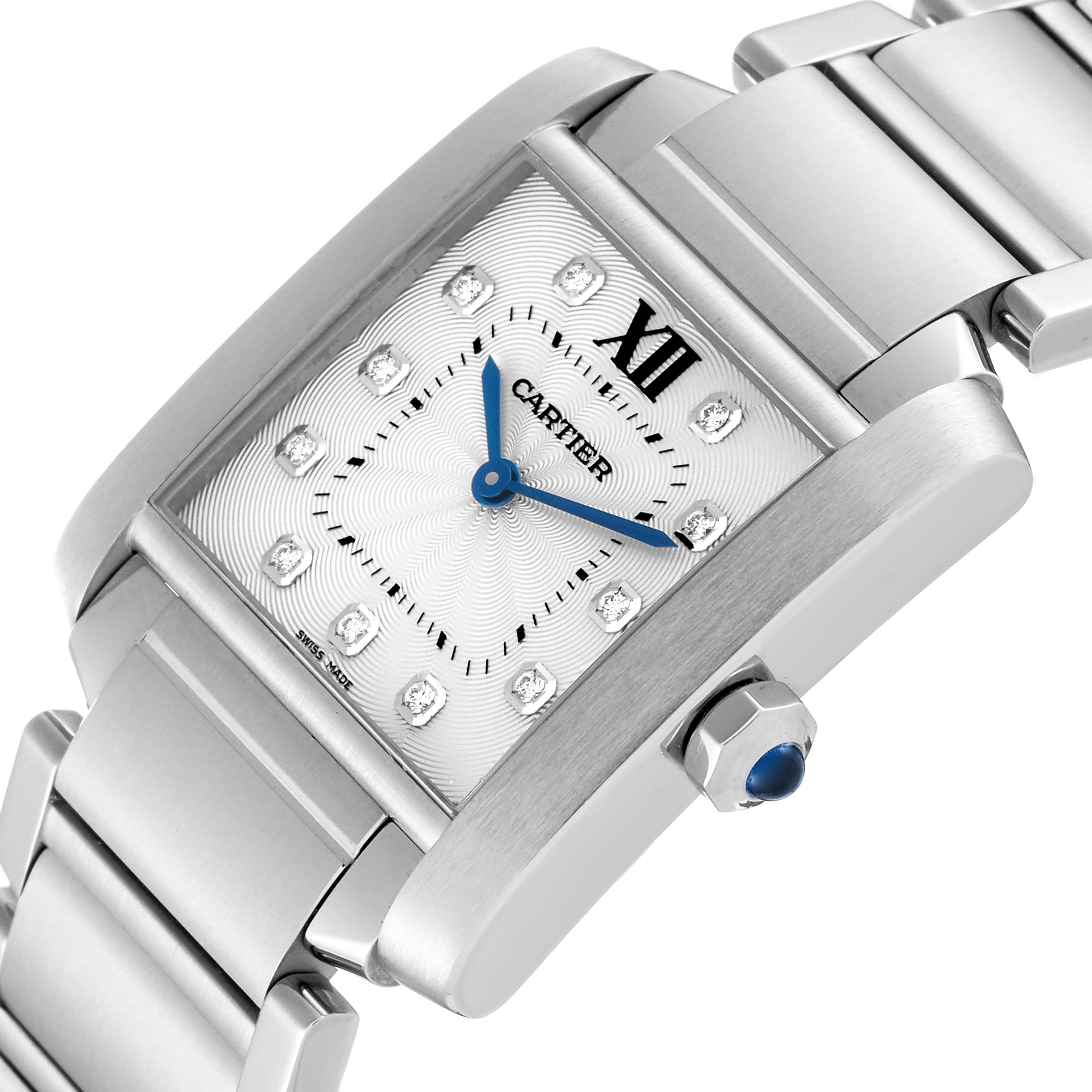 The image shows a close-up angle of the Cartier Tank Francaise WE110007 Women's Stainless Steel Silver Dial WE110007 Women's Stainless Steel Silver Dial watch, highlighting its face, blue hands, and metal bracelet.