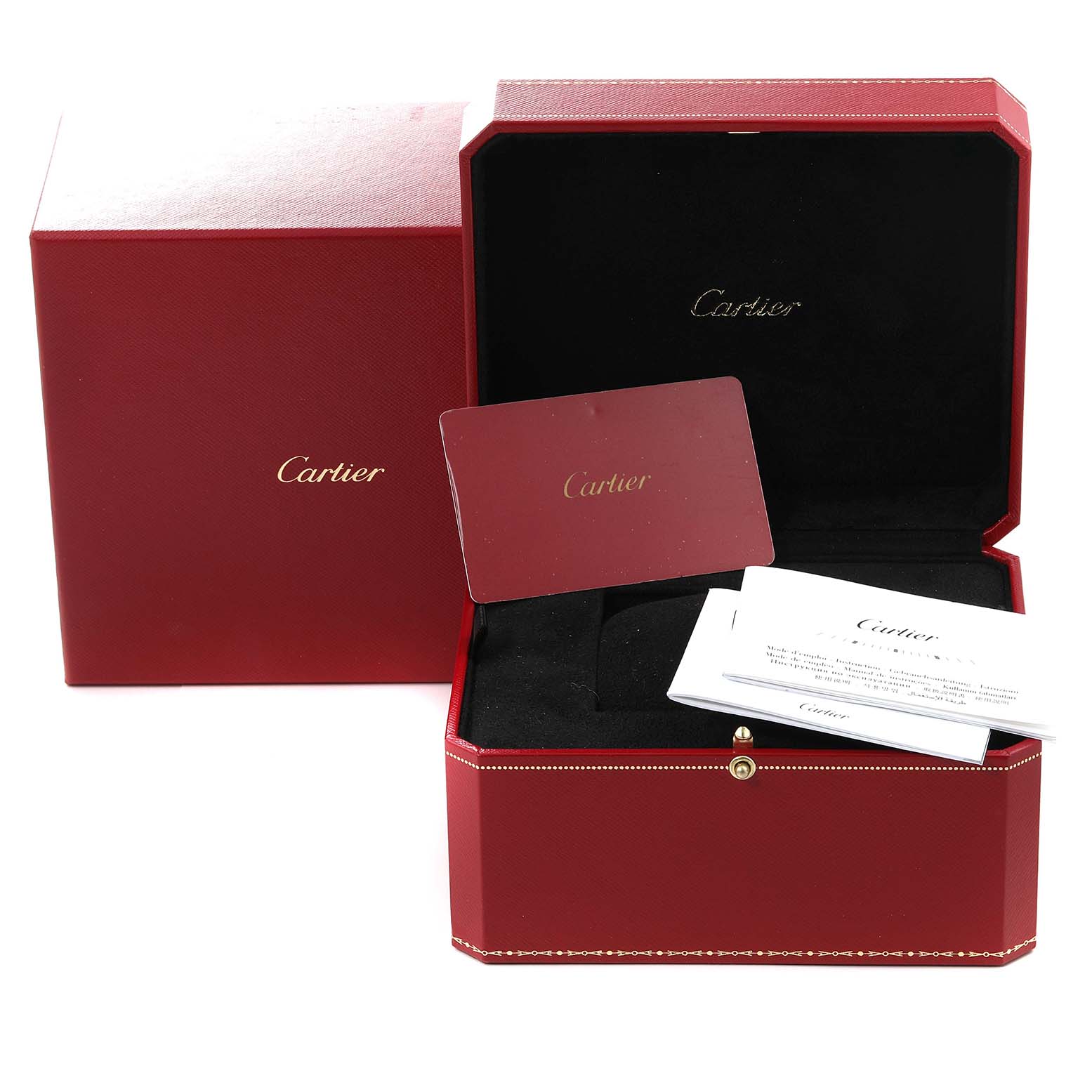 The image shows the packaging and accessories for the Cartier Tank Française model, including a case, a warranty card, and documents.