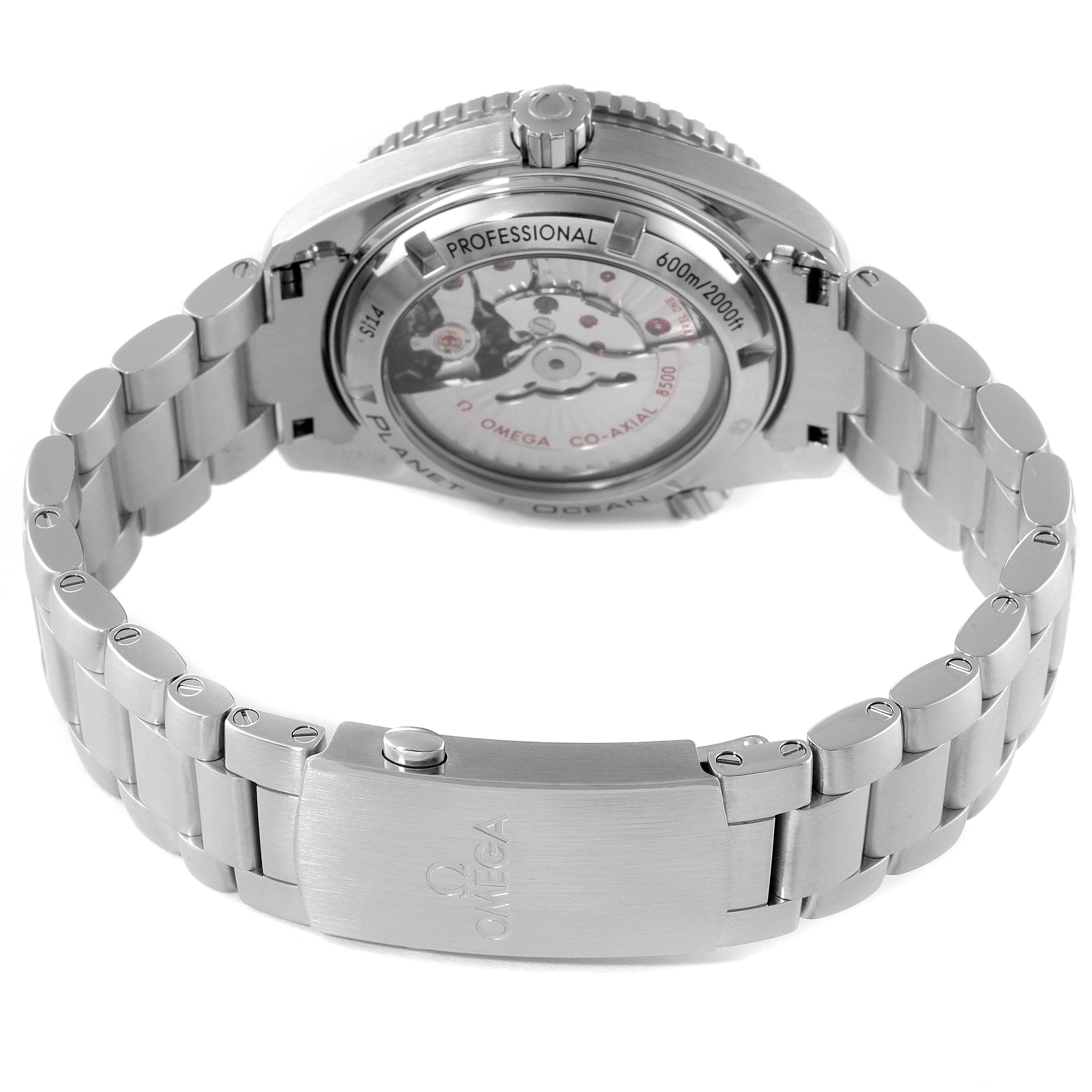 The image shows the back view of an Omega Planet Ocean 232.30.42.21.01.001 Men
s Stainless Steel Black Dial 232.30.42.21.01.001 Men
s Stainless Steel Black Dial watch, highlighting the movement through a transparent case back and the bracelet.