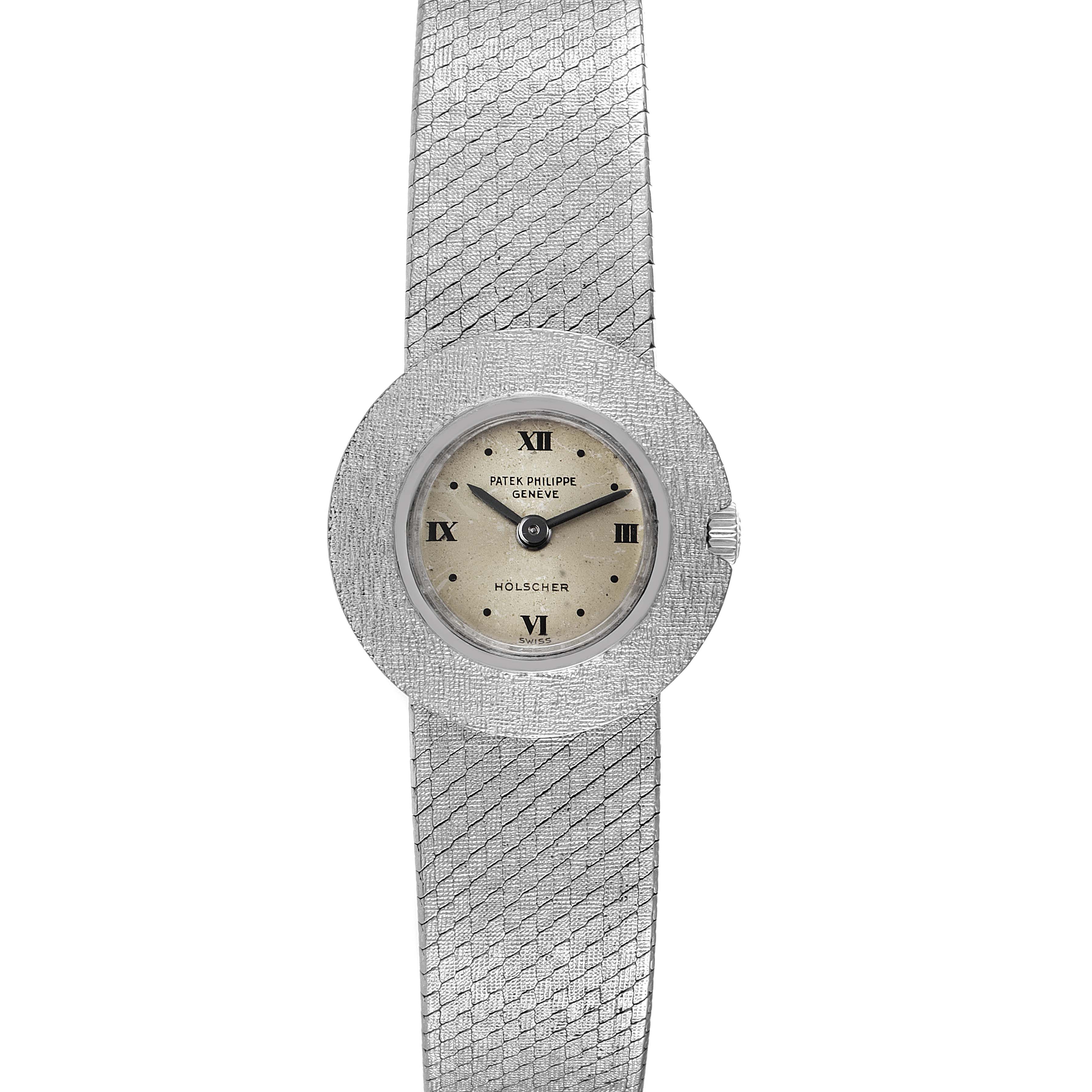 The image shows a front view of a Patek Philippe Calatrava 3344 Women's White Gold Silver Dial 3344 Women's White Gold Silver Dial watch, including the dial, case, and bracelet.