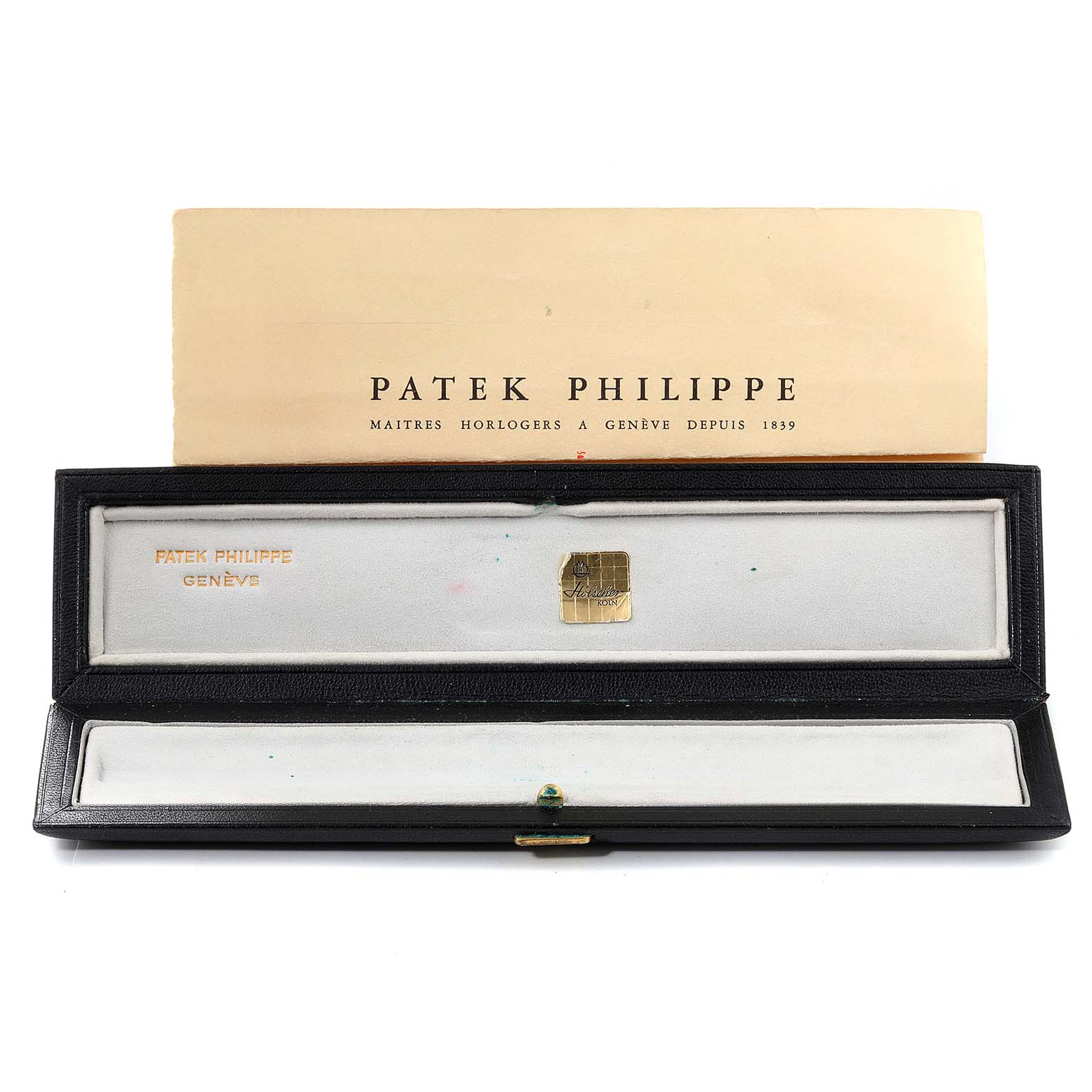 The image displays the box and certificate for a Patek Philippe Calatrava 3344 Women's White Gold Silver Dial 3344 Women's White Gold Silver Dial watch from a top-down angle.