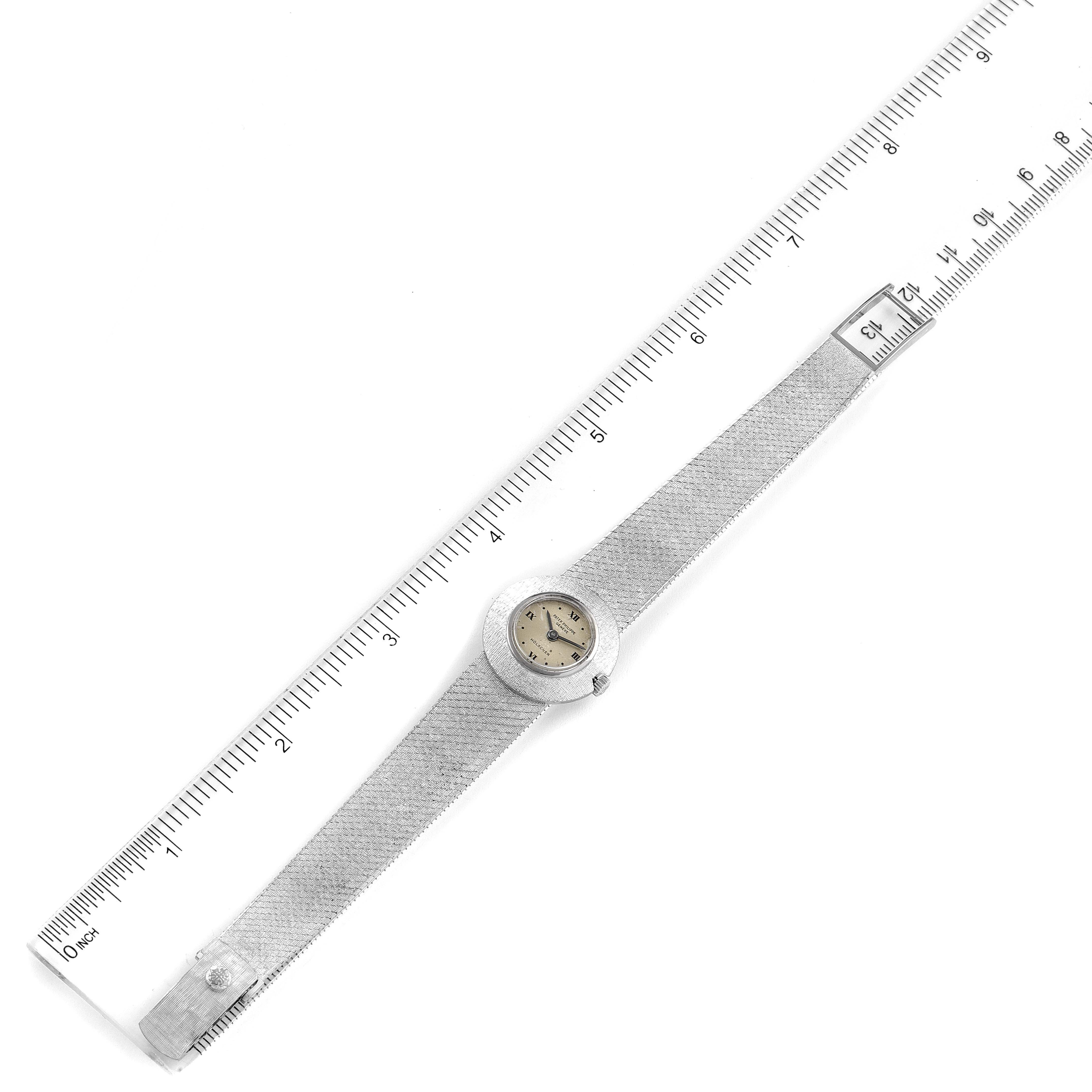 The image shows a full top-down view of a Patek Philippe Calatrava 3344 Women's White Gold Silver Dial 3344 Women's White Gold Silver Dial watch with a measurement ruler.