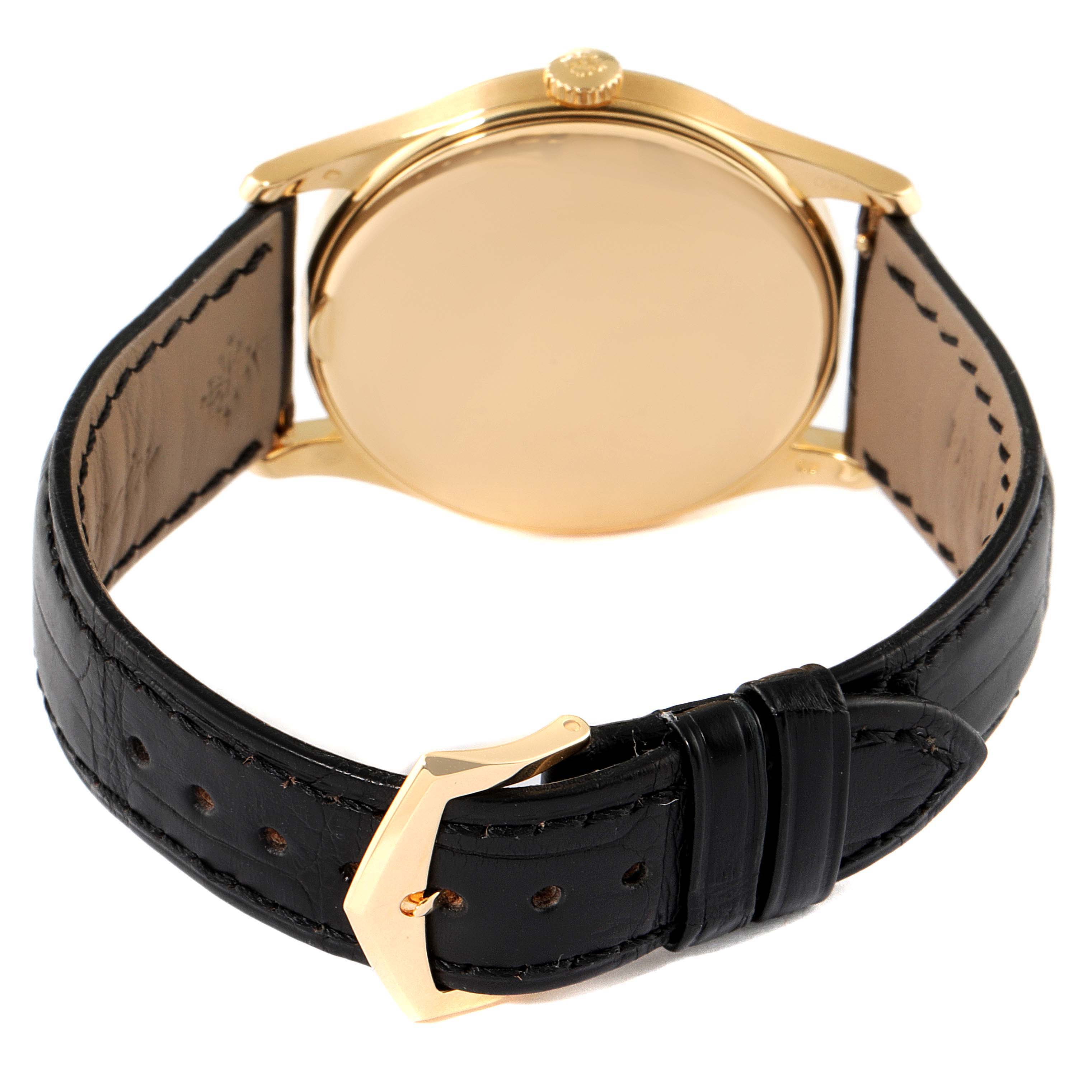 This is a rear angle view showing the case back and strap of a Patek Philippe Calatrava 5196J Men's Yellow Gold Silver Dial 5196J Men's Yellow Gold Silver Dial watch.