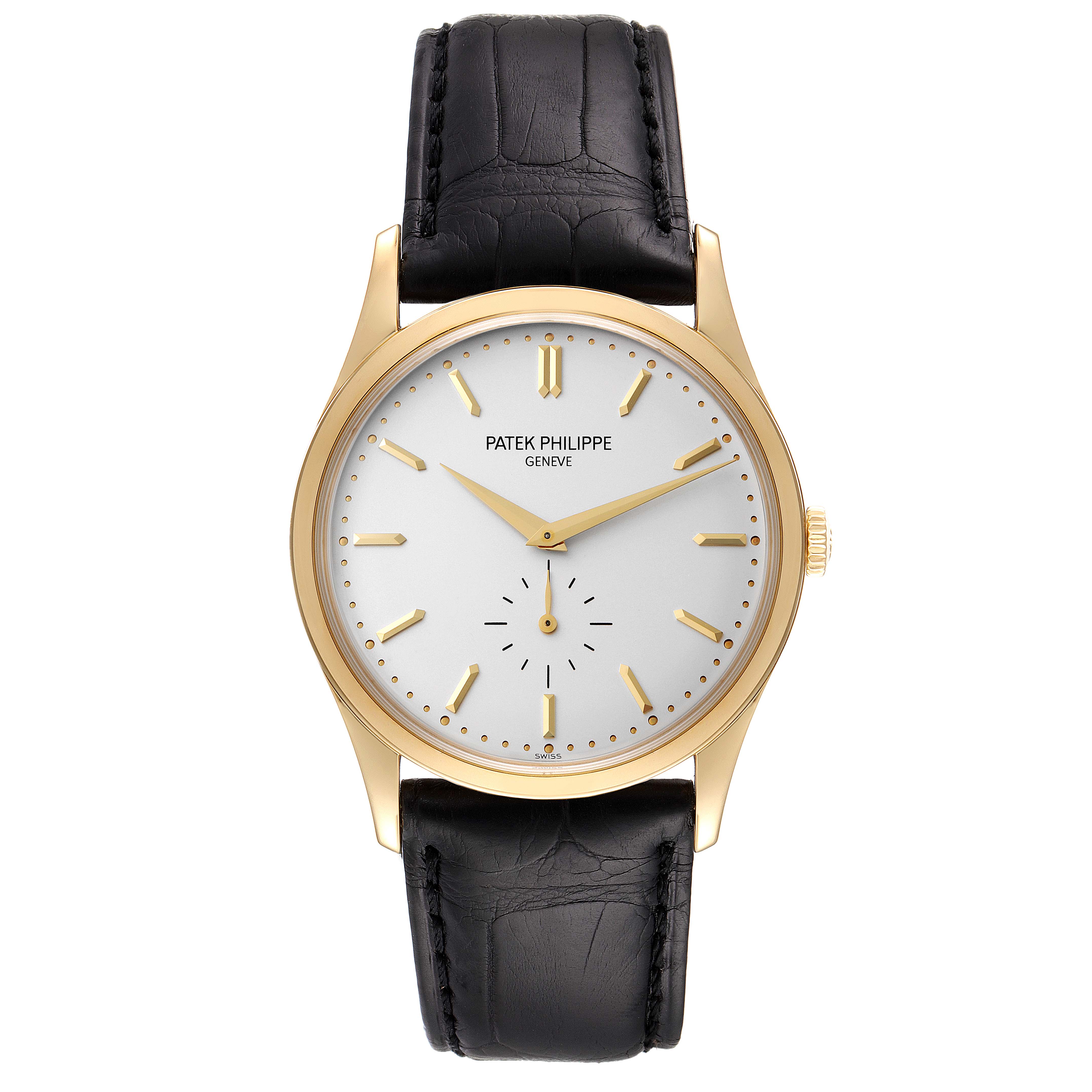 The image shows a Patek Philippe Calatrava 5196J Men's Yellow Gold Silver Dial 5196J Men's Yellow Gold Silver Dial watch from a front angle, featuring a gold case, white dial, and black leather strap.