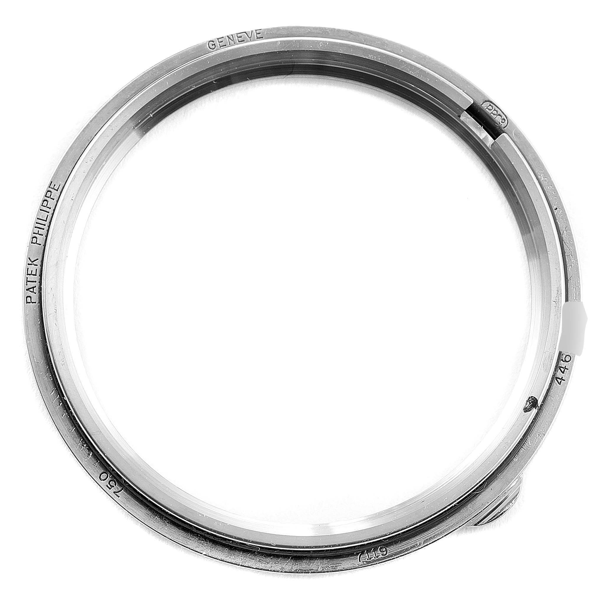 This image shows the bezel or case ring of a Patek Philippe Calatrava 7119G Men's White Gold Silver Dial 7119G Men's White Gold Silver Dial watch, viewed from the top.