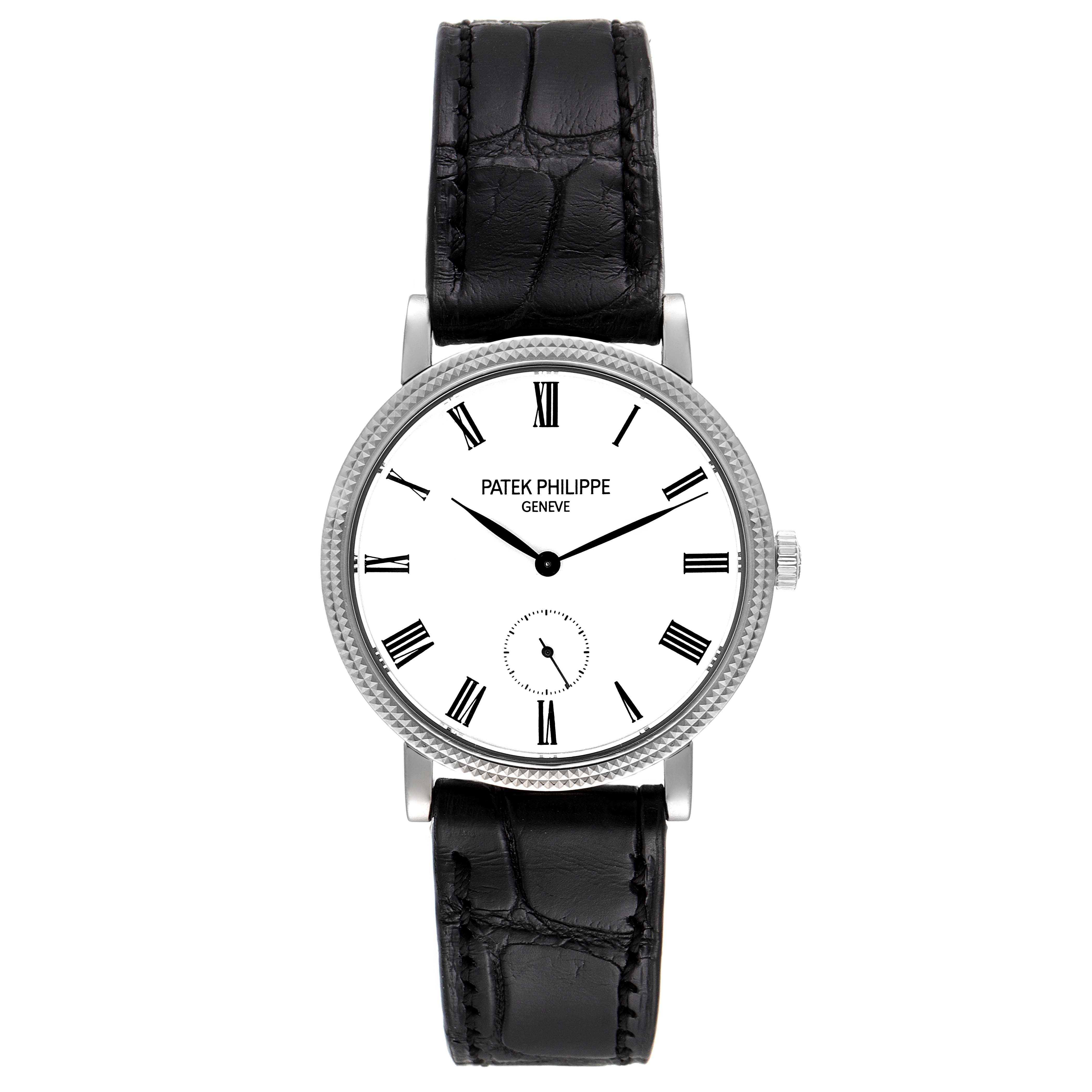 The Patek Philippe Calatrava 7119G Women's White Gold White Dial 7119G Women's White Gold White Dial watch is shown from a straight-on angle, displaying its face, dial, and black leather strap.