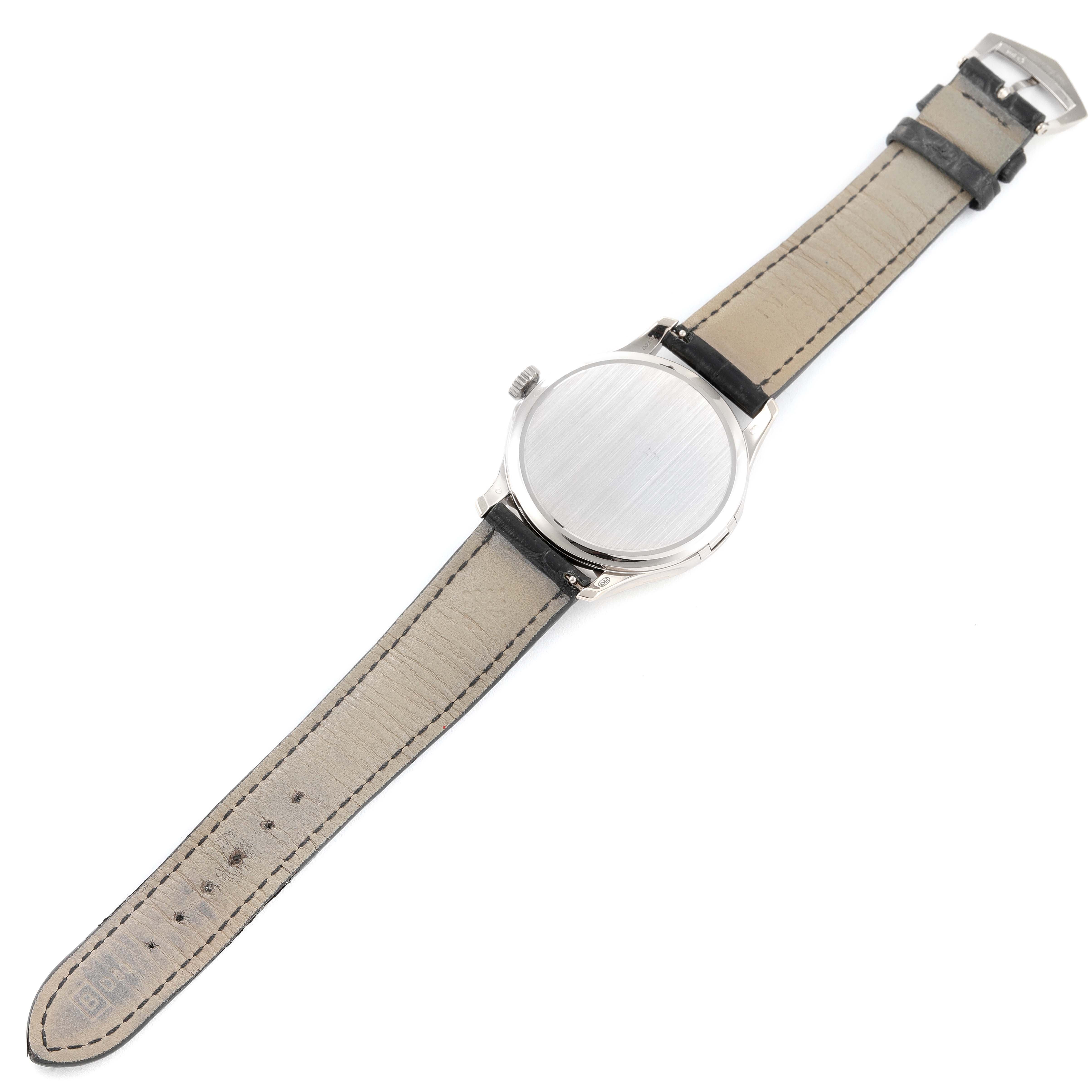 The image shows the back view of a Patek Philippe Calatrava 5227G Men's White Gold Black Dial 5227G Men's White Gold Black Dial watch, displaying the case back and entire strap.