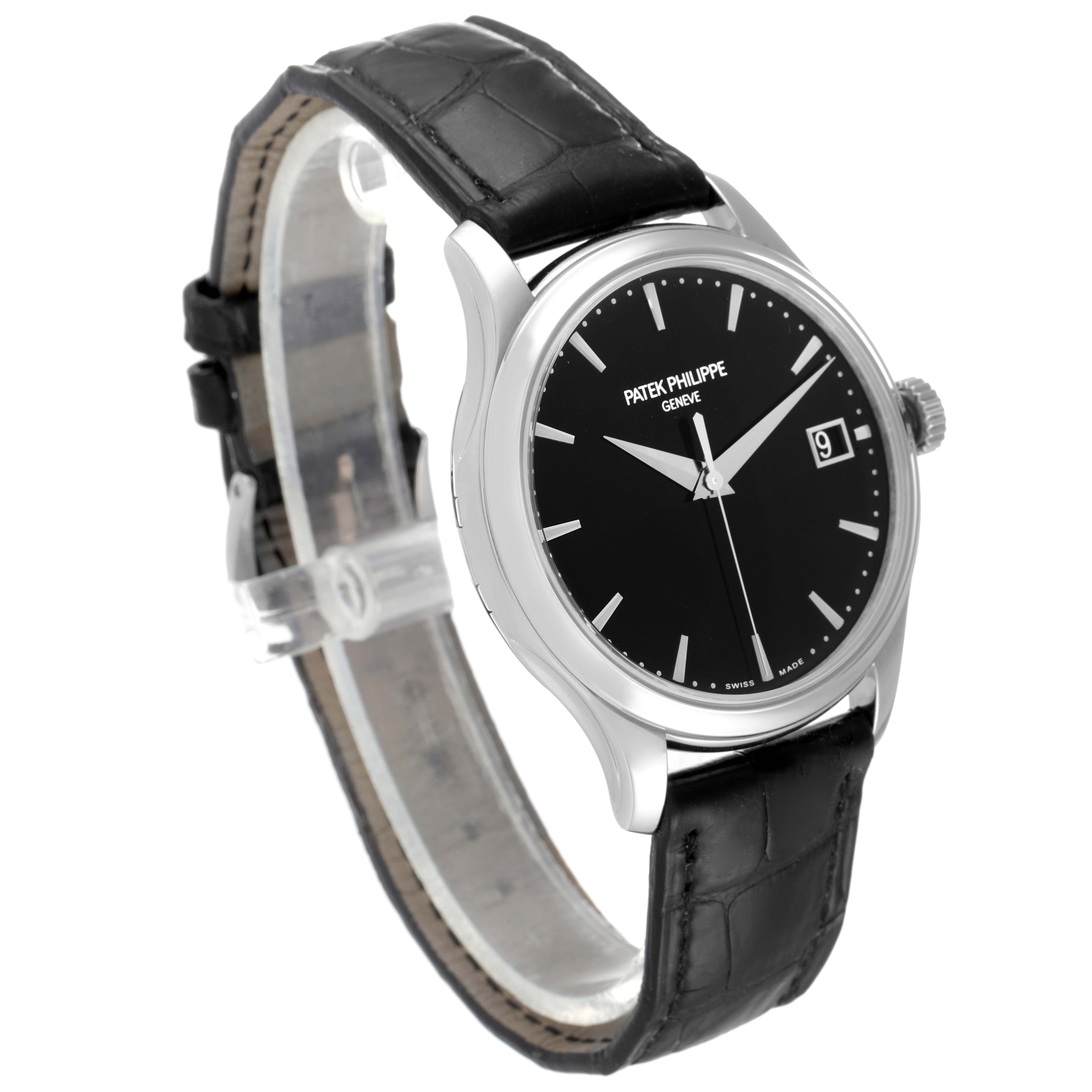 The Patek Philippe Calatrava 5227G Men's White Gold Black Dial 5227G Men's White Gold Black Dial watch is shown at an oblique angle highlighting the face, black strap, and crown.